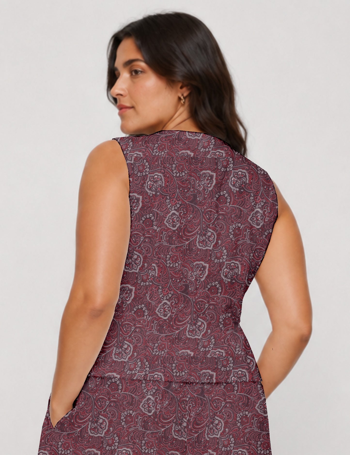 Women's fitted waistcoat with V-neck, single-breasted button closure, tailored silhouette, and pointed hem in sustainable fashion.