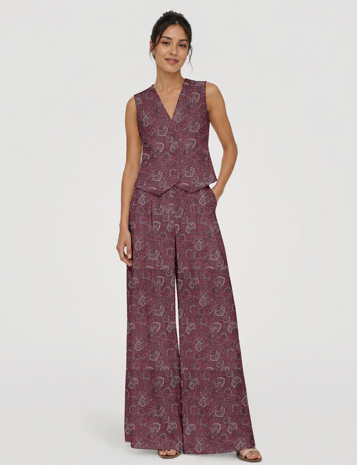 Women's tailored waistcoat set with a sleeveless V-neck button-front waistcoat and high-rise wide leg trousers in a coordinated matching outfit.