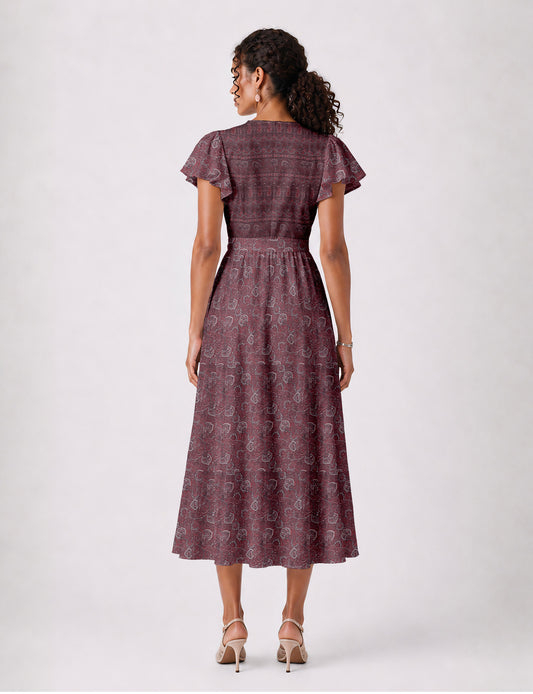 Elegant midi wrap dress with a V-neckline, adjustable waist tie, fitted bodice, and flared skirt for a timeless, flattering silhouette.