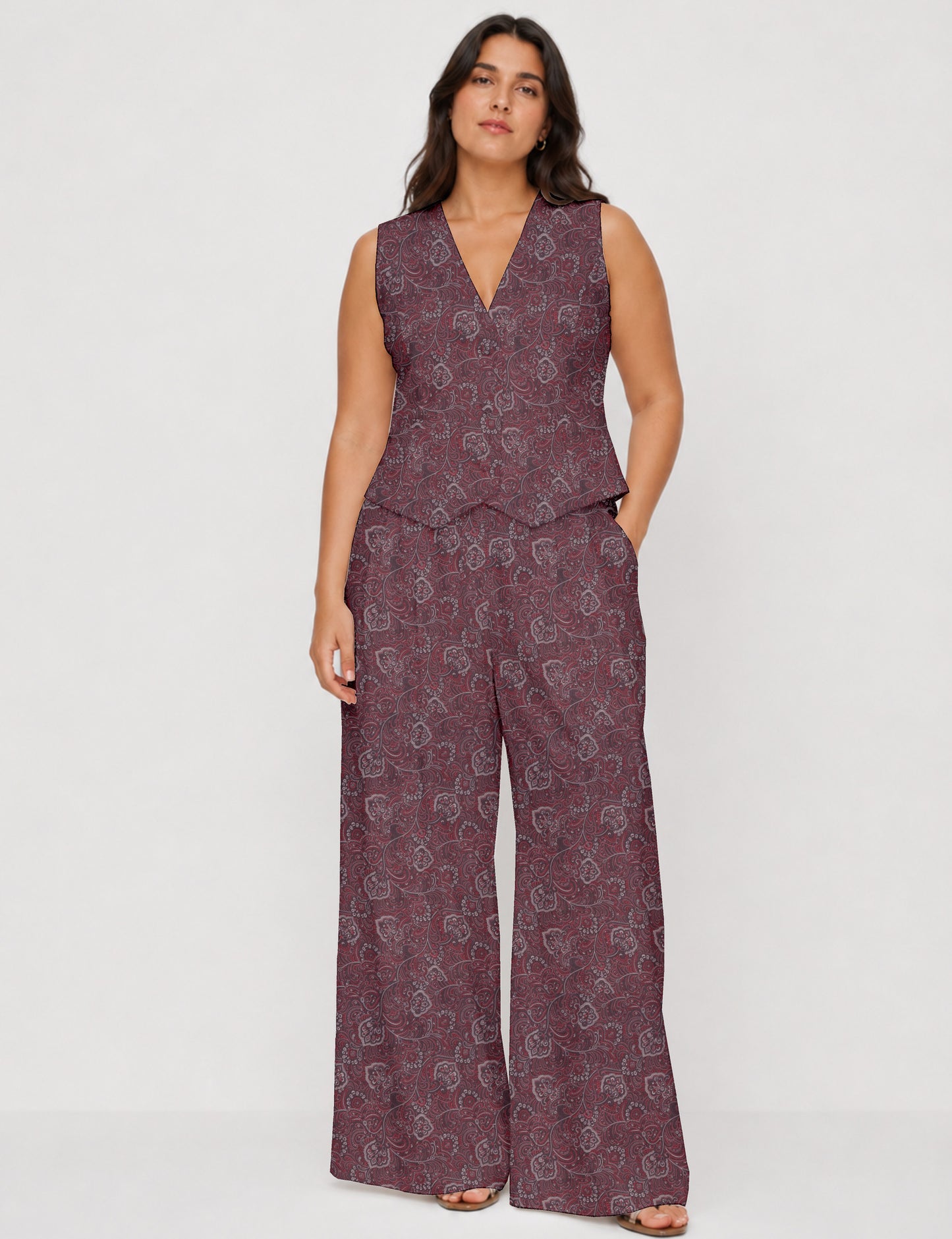Women's tailored waistcoat set with a sleeveless V-neck button-front waistcoat and high-rise wide leg trousers in a coordinated matching outfit.