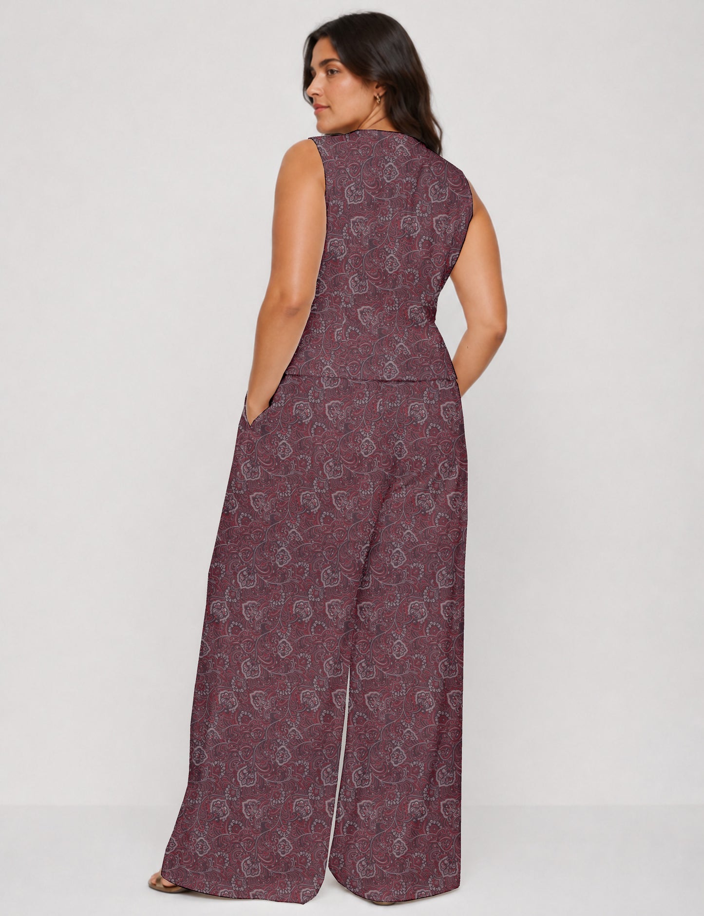 Women's tailored waistcoat set with a sleeveless V-neck button-front waistcoat and high-rise wide leg trousers in a coordinated matching outfit.