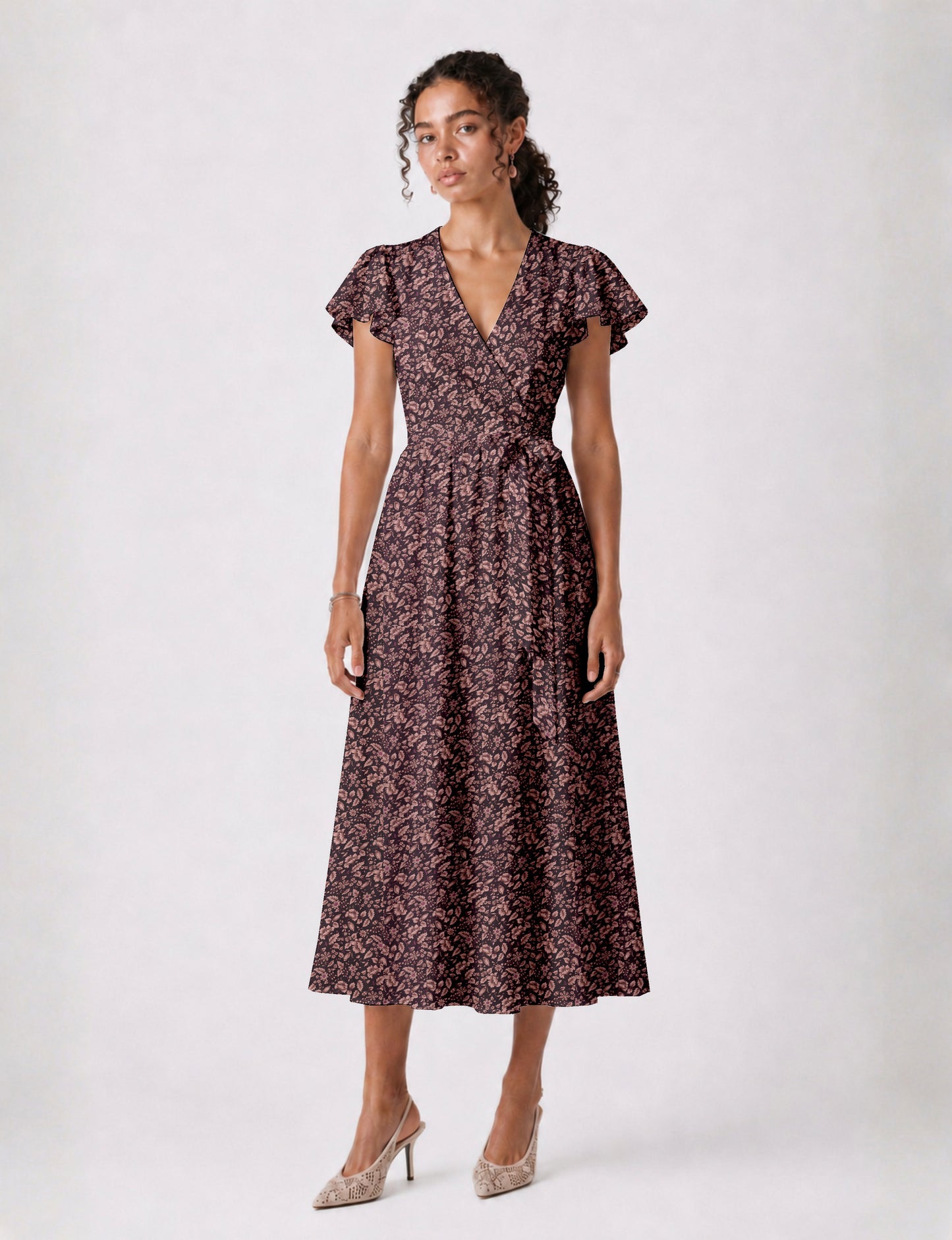 Elegant midi wrap dress with a V-neckline, adjustable waist tie, fitted bodice, and flared skirt for a timeless, flattering silhouette.