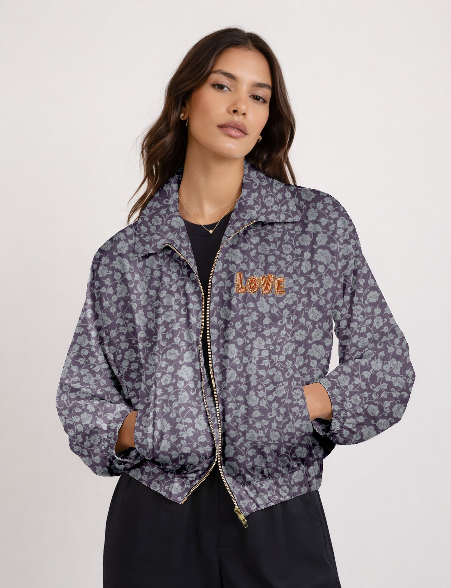 Love Bomber Jacket made from recycled fabric, featuring hand-stitched Aari embroidery. A unique piece of zero-waste clothing, part of the circular fashion movement. Designed with upcycled materials for a stylish yet environmentally friendly clothing choice.