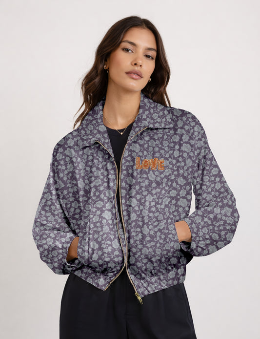 Love Bomber Jacket made from recycled fabric, featuring hand-stitched Aari embroidery. A unique piece of zero-waste clothing, part of the circular fashion movement. Designed with upcycled materials for a stylish yet environmentally friendly clothing choice.