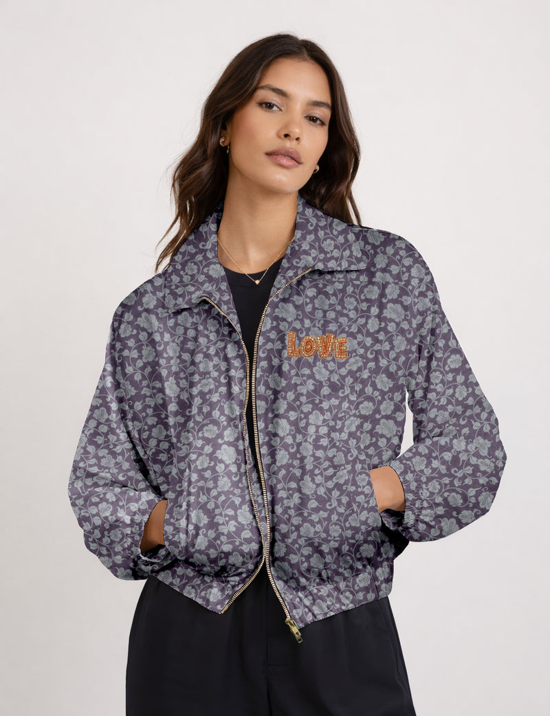 Love Bomber Jacket made from recycled fabric, featuring hand-stitched Aari embroidery. A unique piece of zero-waste clothing, part of the circular fashion movement. Designed with upcycled materials for a stylish yet environmentally friendly clothing choice.