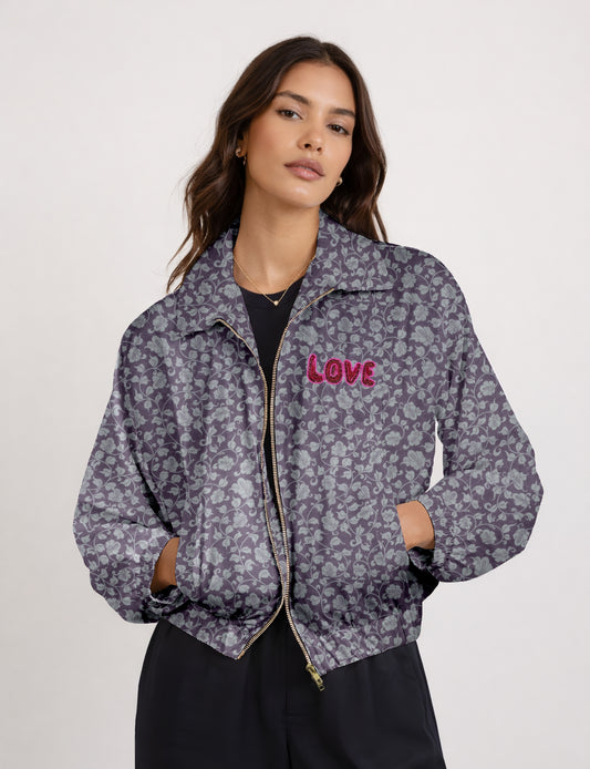 Love Bomber Jacket made from recycled fabric, featuring hand-stitched Aari embroidery. A unique piece of zero-waste clothing, part of the circular fashion movement. Designed with upcycled materials for a stylish yet environmentally friendly clothing choice.