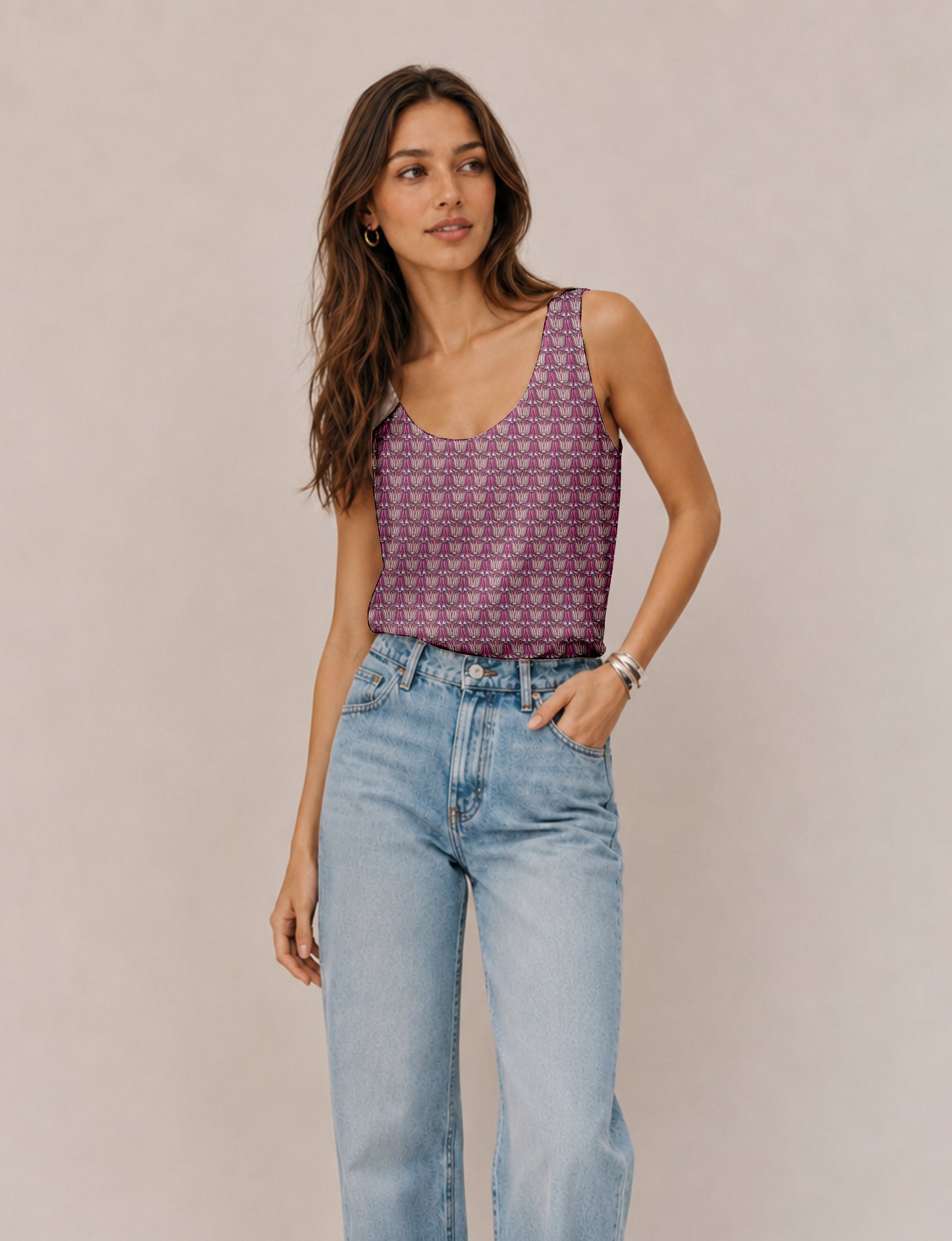Women's sleeveless blouse with a relaxed straight fit, wide scoop neckline, deep scoop back, and hip-length silhouette.