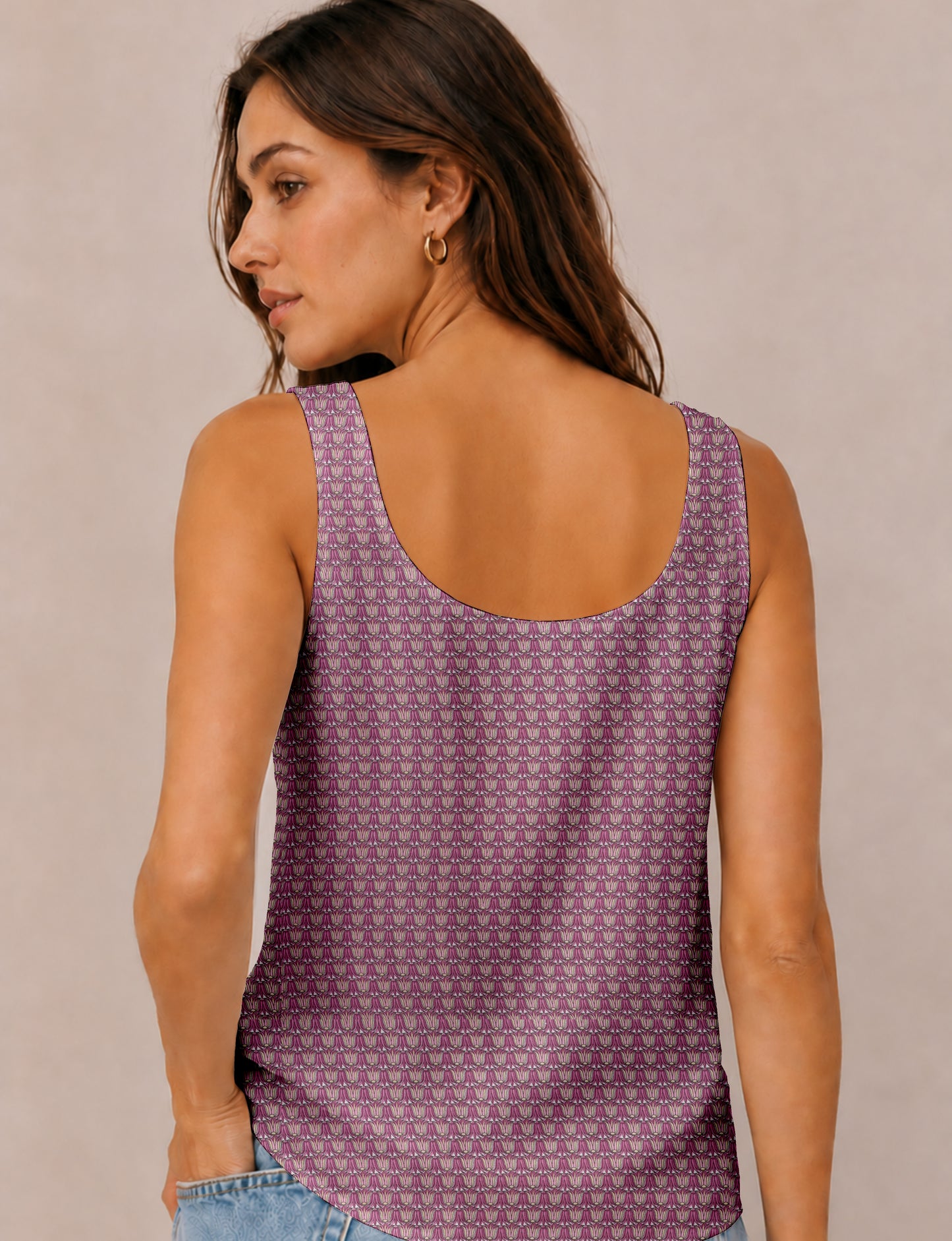 Women's sleeveless blouse with a relaxed straight fit, wide scoop neckline, deep scoop back, and hip-length silhouette.