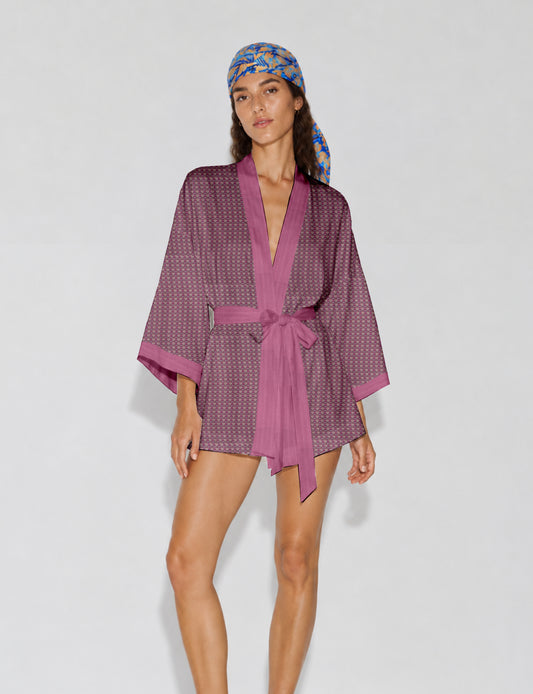 Short kimono robe with wrap front, V-neckline, wide sleeves, waist tie, and concealed skort detail.