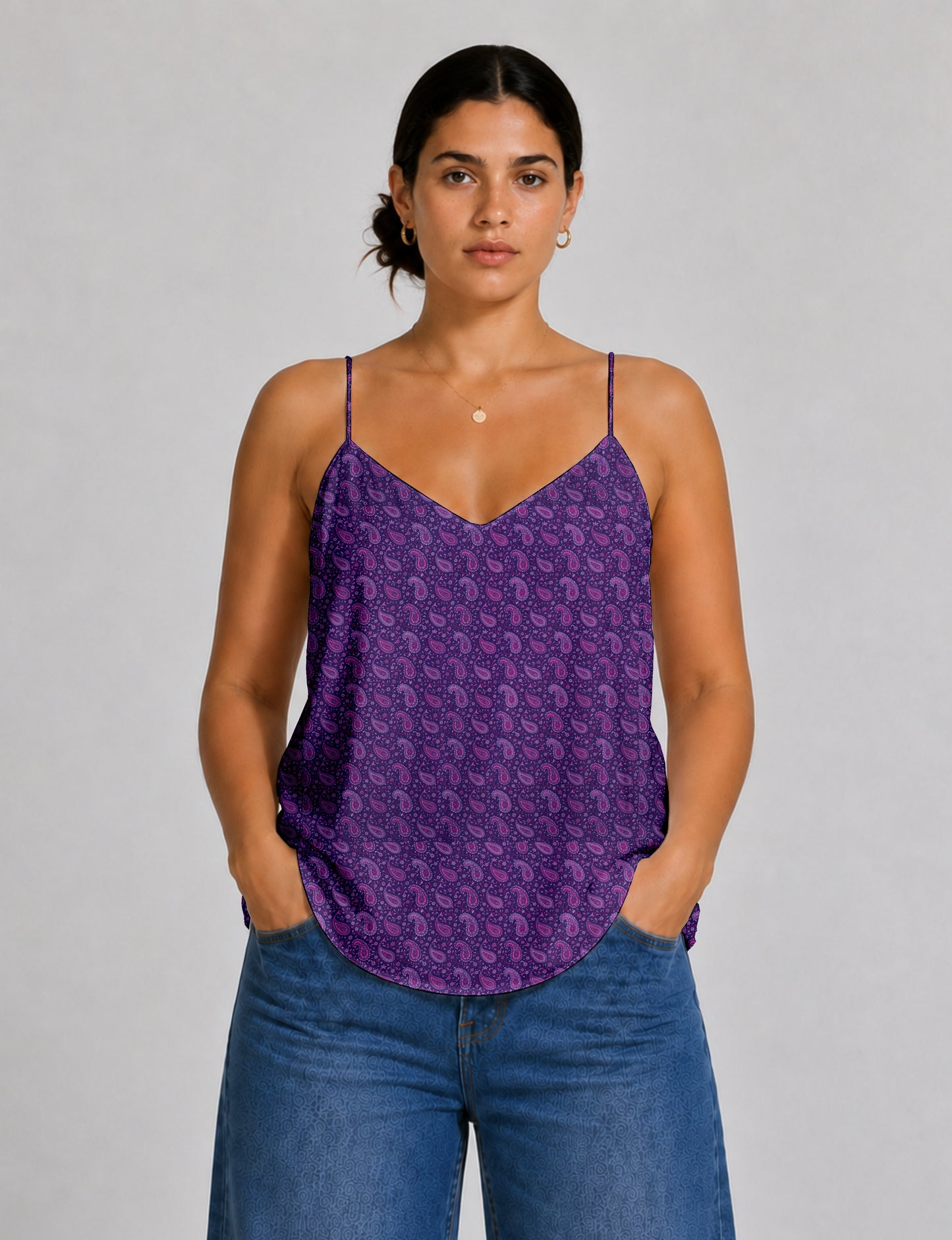 Women's sleeveless slip top with a relaxed straight fit, soft V-neckline, deep V-back, and delicate spaghetti straps.