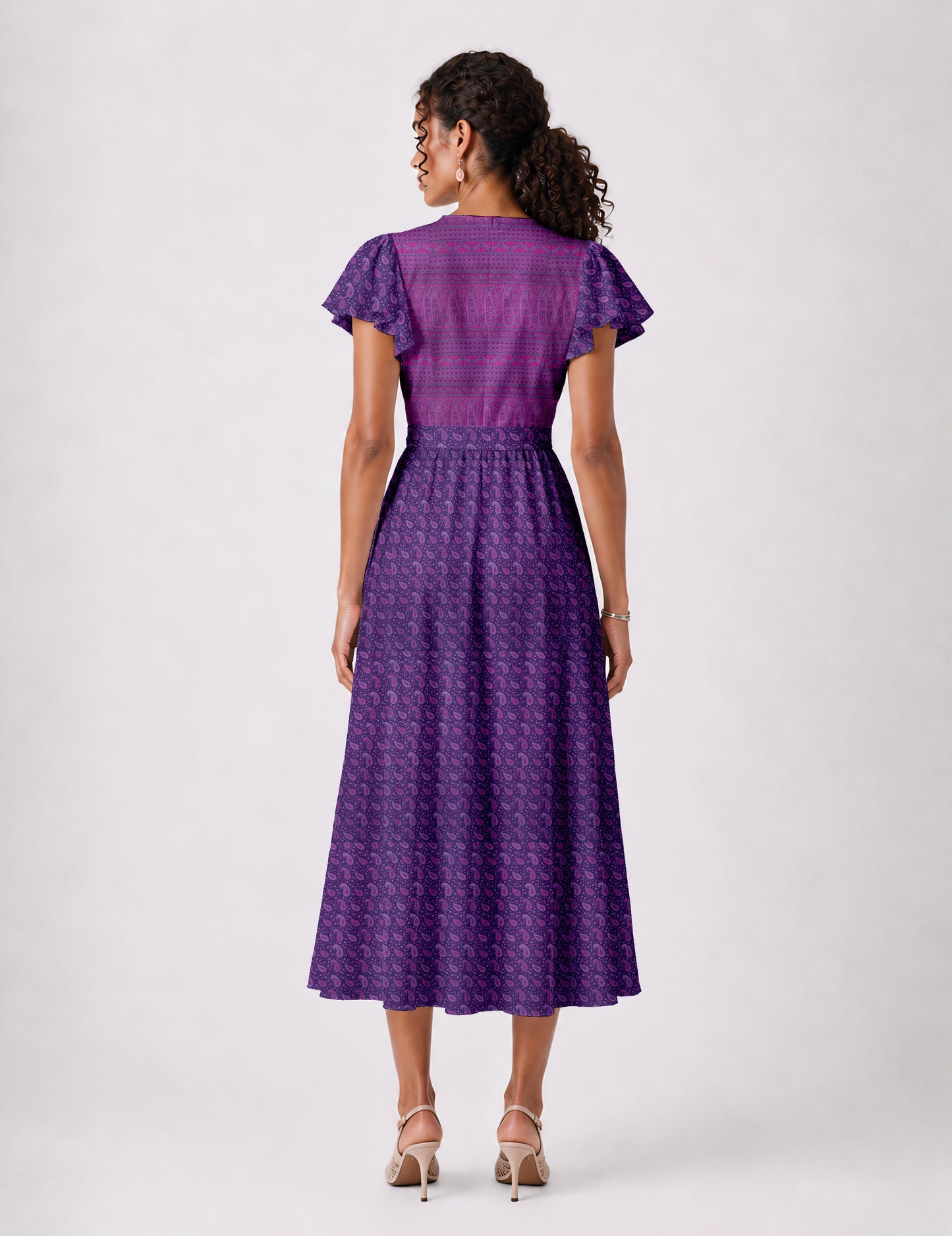 Midi wrap dress with V-neckline, fitted bodice, tie waist, and flared mid-calf skirt