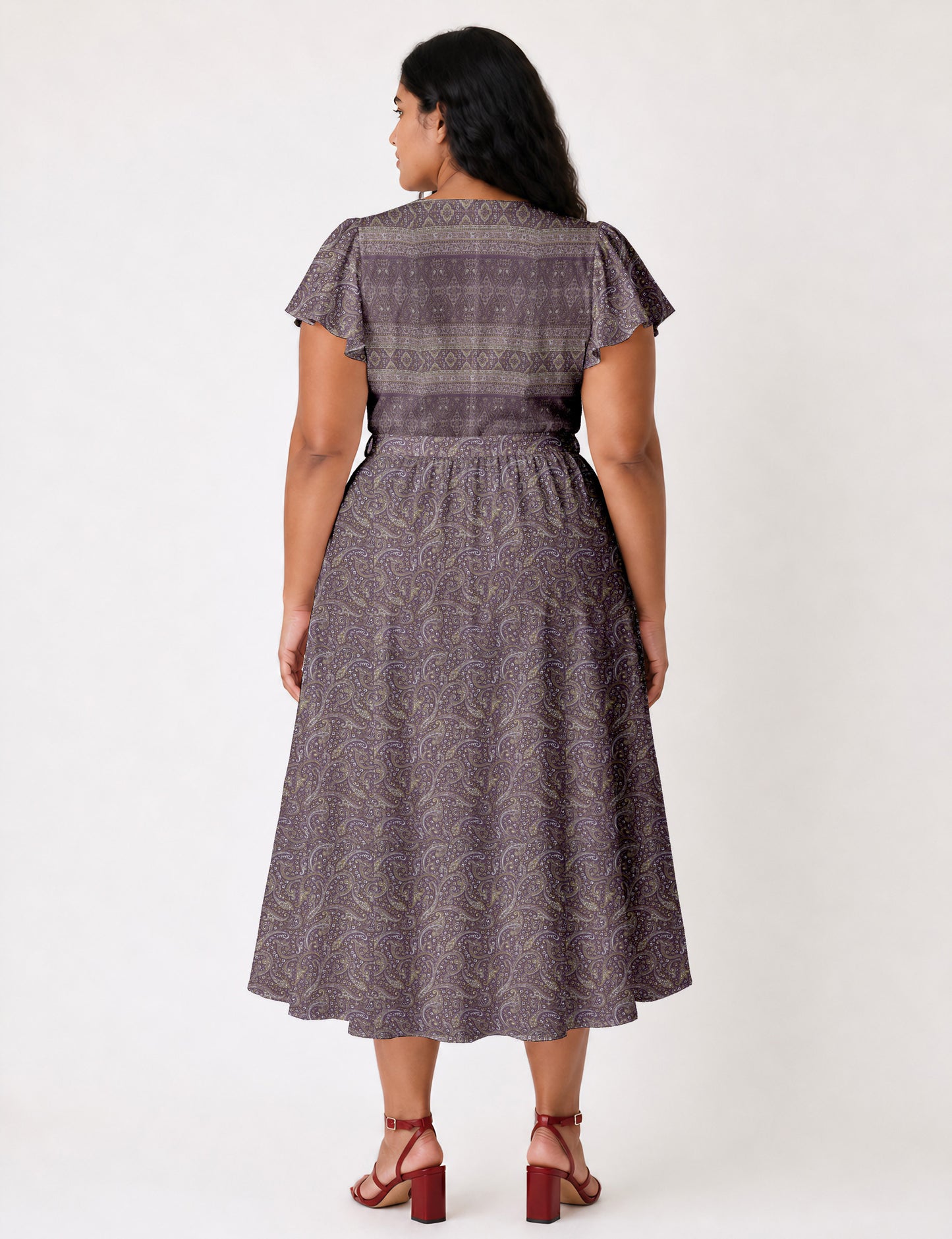 Elegant midi wrap dress with a V-neckline, adjustable waist tie, fitted bodice, and flared skirt for a timeless, flattering silhouette.