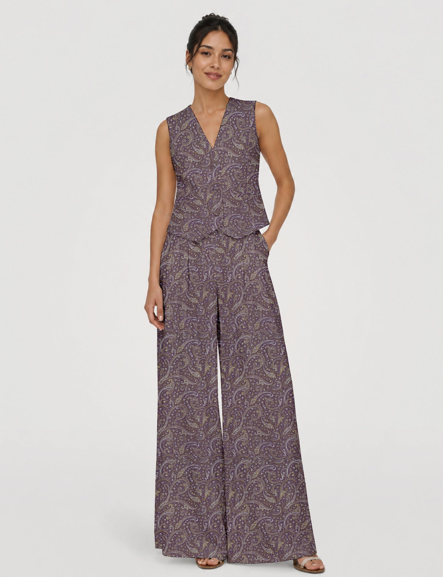Women's tailored waistcoat set with a sleeveless V-neck button-front waistcoat and high-rise wide leg trousers in a coordinated matching outfit.