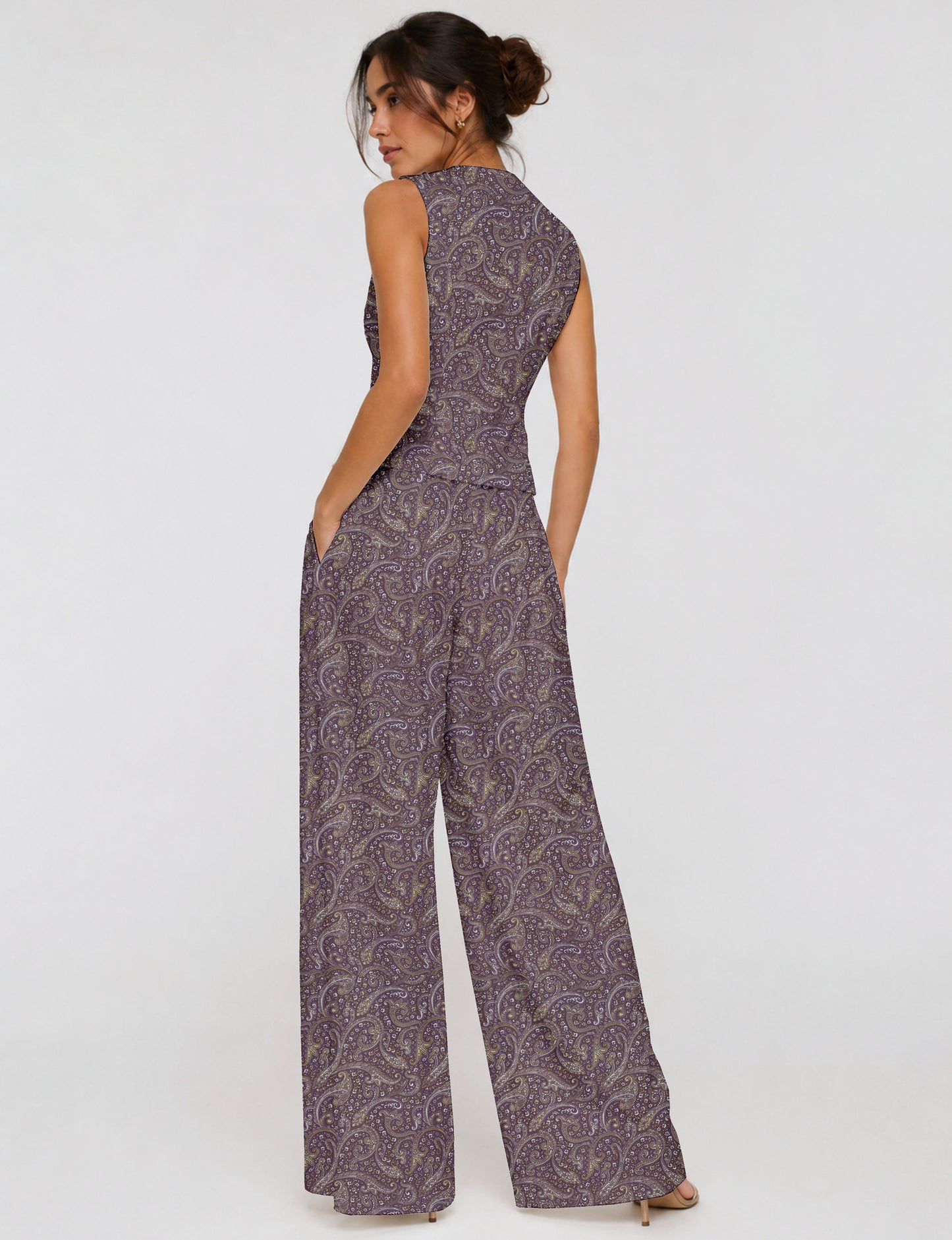 Women's tailored waistcoat set with a sleeveless V-neck button-front waistcoat and high-rise wide leg trousers in a coordinated matching outfit.