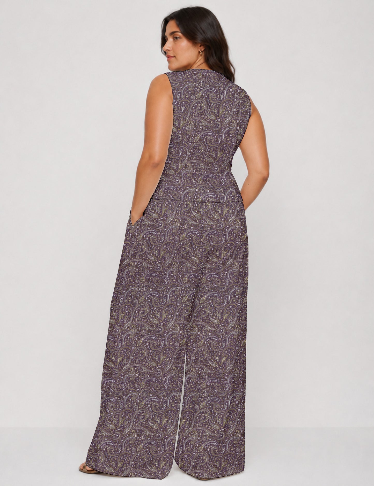 Women's tailored waistcoat set with a sleeveless V-neck button-front waistcoat and high-rise wide leg trousers in a coordinated matching outfit.