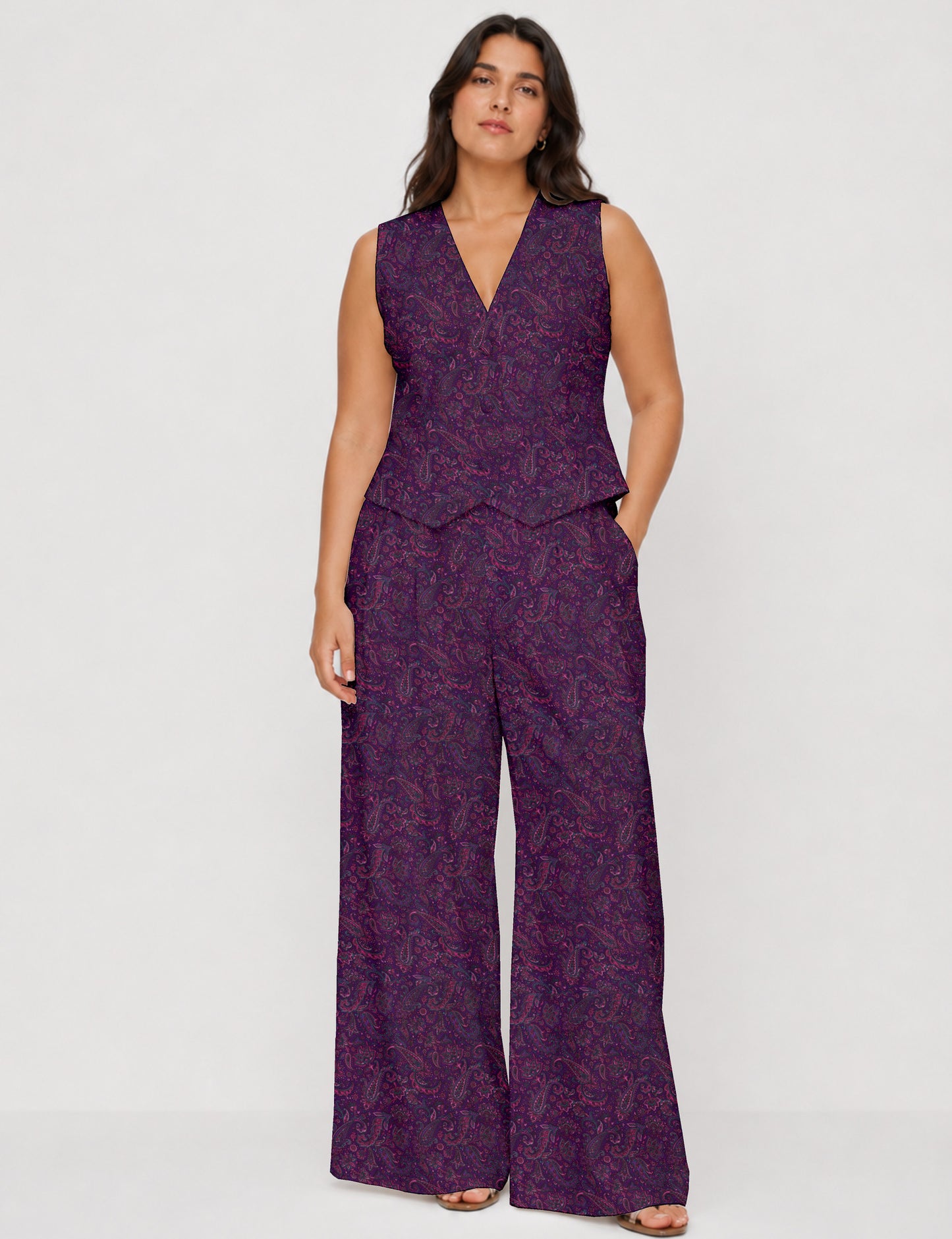 Women's tailored waistcoat set with a sleeveless V-neck button-front waistcoat and high-rise wide leg trousers in a coordinated matching outfit.
