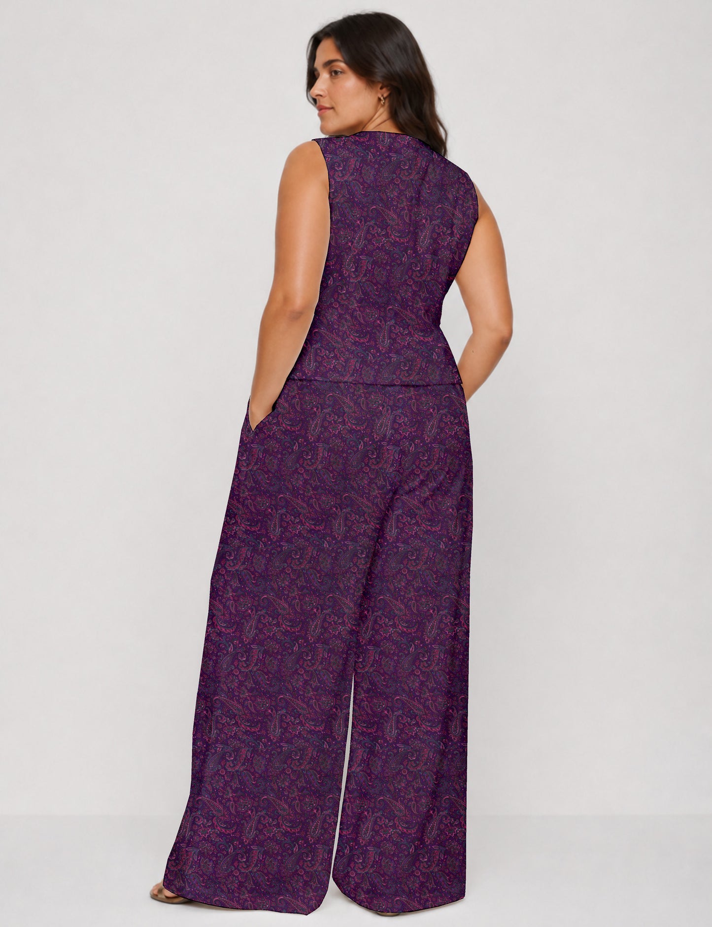 Women's tailored waistcoat set with a sleeveless V-neck button-front waistcoat and high-rise wide leg trousers in a coordinated matching outfit.
