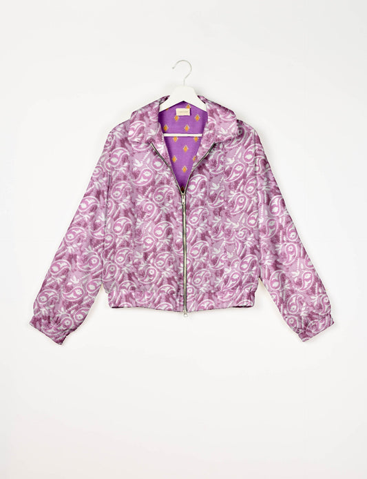 Upcycled Bomber Jacket made from recycled sari materials, featuring a cute cropped shape, elasticated hem and cuffs, and contrast sari print lining. Sustainable apparel promoting eco-friendly fashion and ethical clothing.