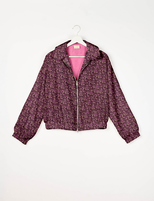 Upcycled Bomber Jacket made from recycled sari materials, featuring a cute cropped shape, elasticated hem and cuffs, and contrast sari print lining. Sustainable apparel promoting eco-friendly fashion and ethical clothing.