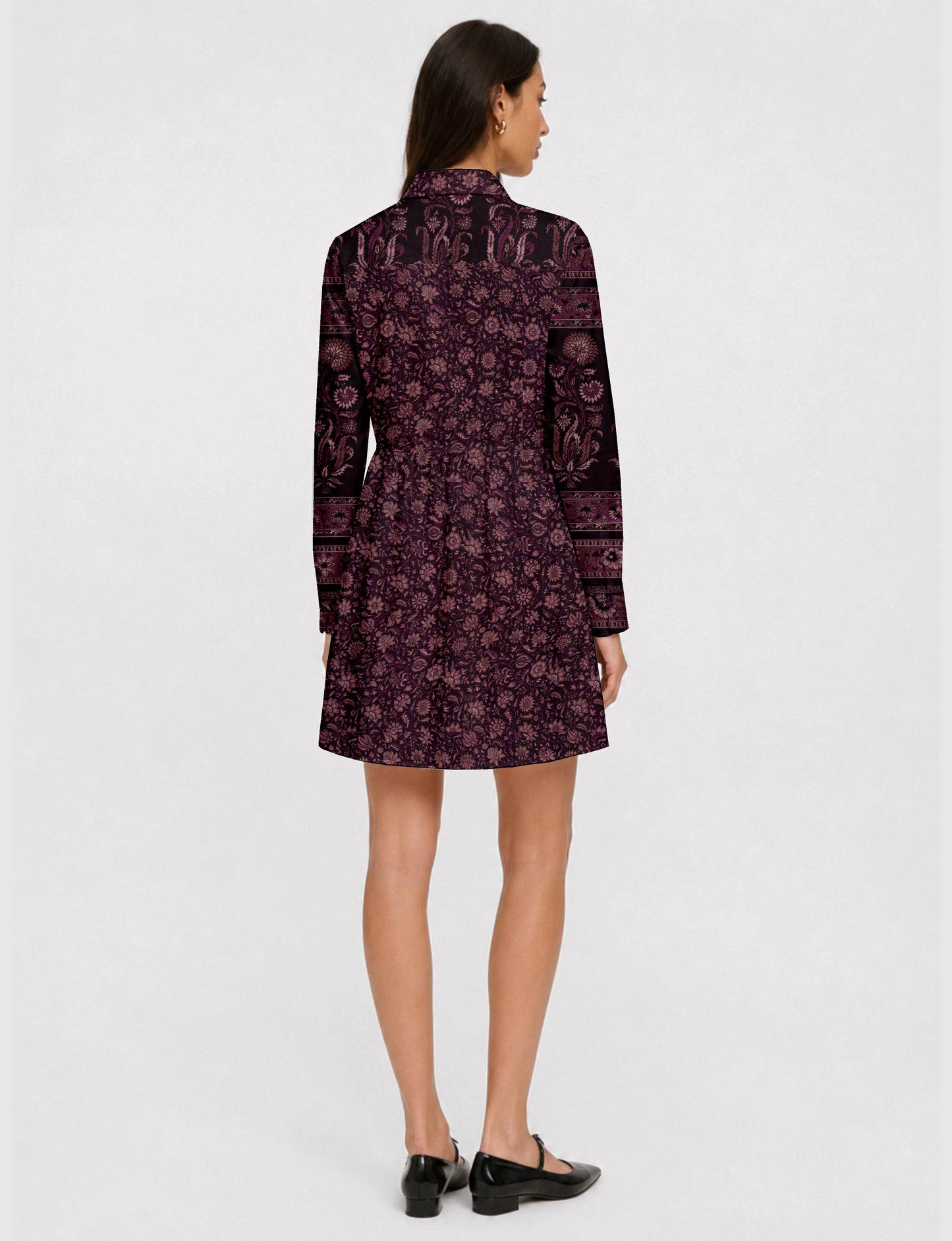 Short shirt dress with a relaxed A-line silhouette, point collar, partial button placket, gathered waist, side pockets, and full-length cuffed sleeves.