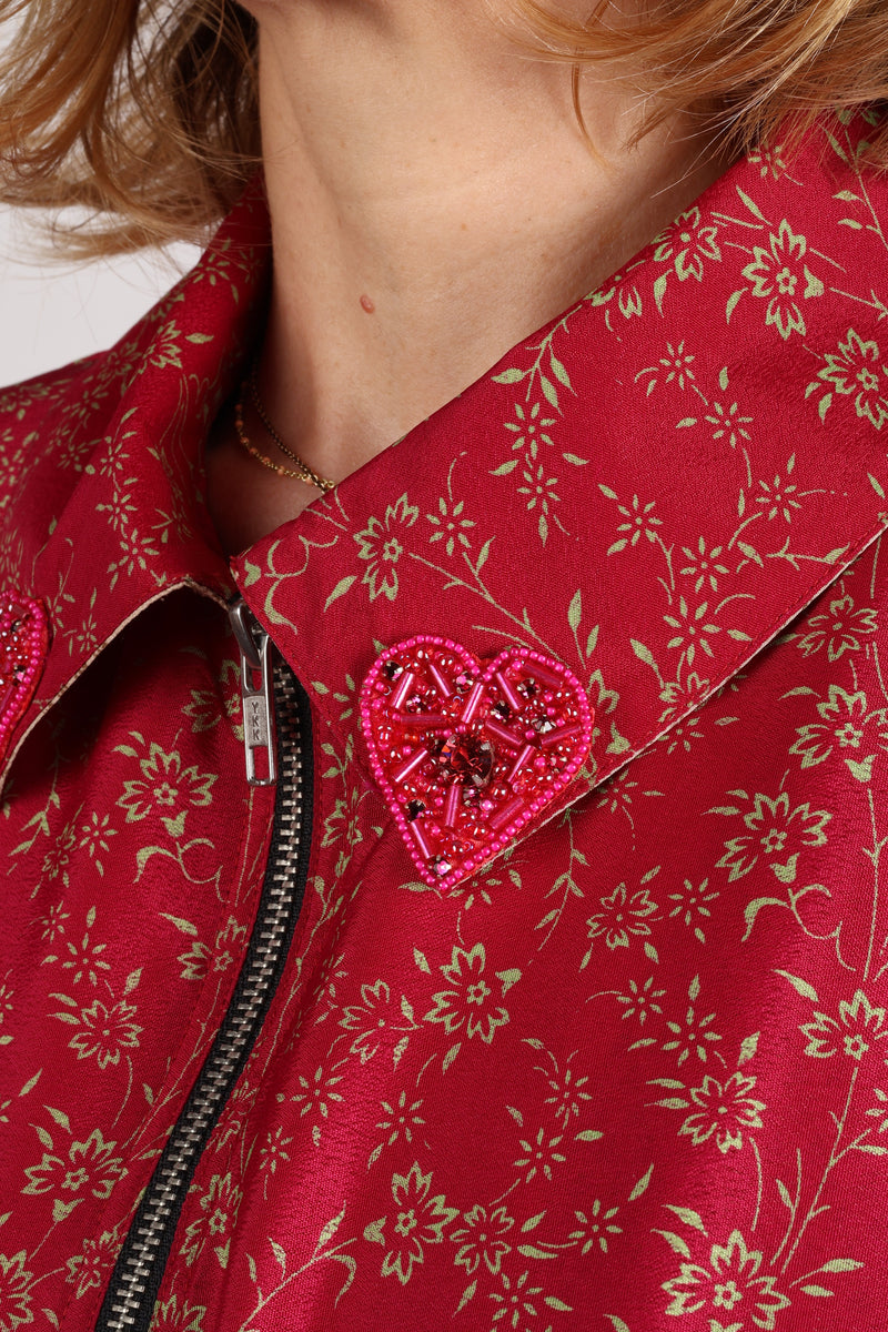 Love Bomber Jacket made from recycled fabric, featuring hand-stitched Aari embroidery. A unique piece of zero-waste clothing, part of the circular fashion movement. Designed with upcycled materials for a stylish yet environmentally friendly clothing choice.