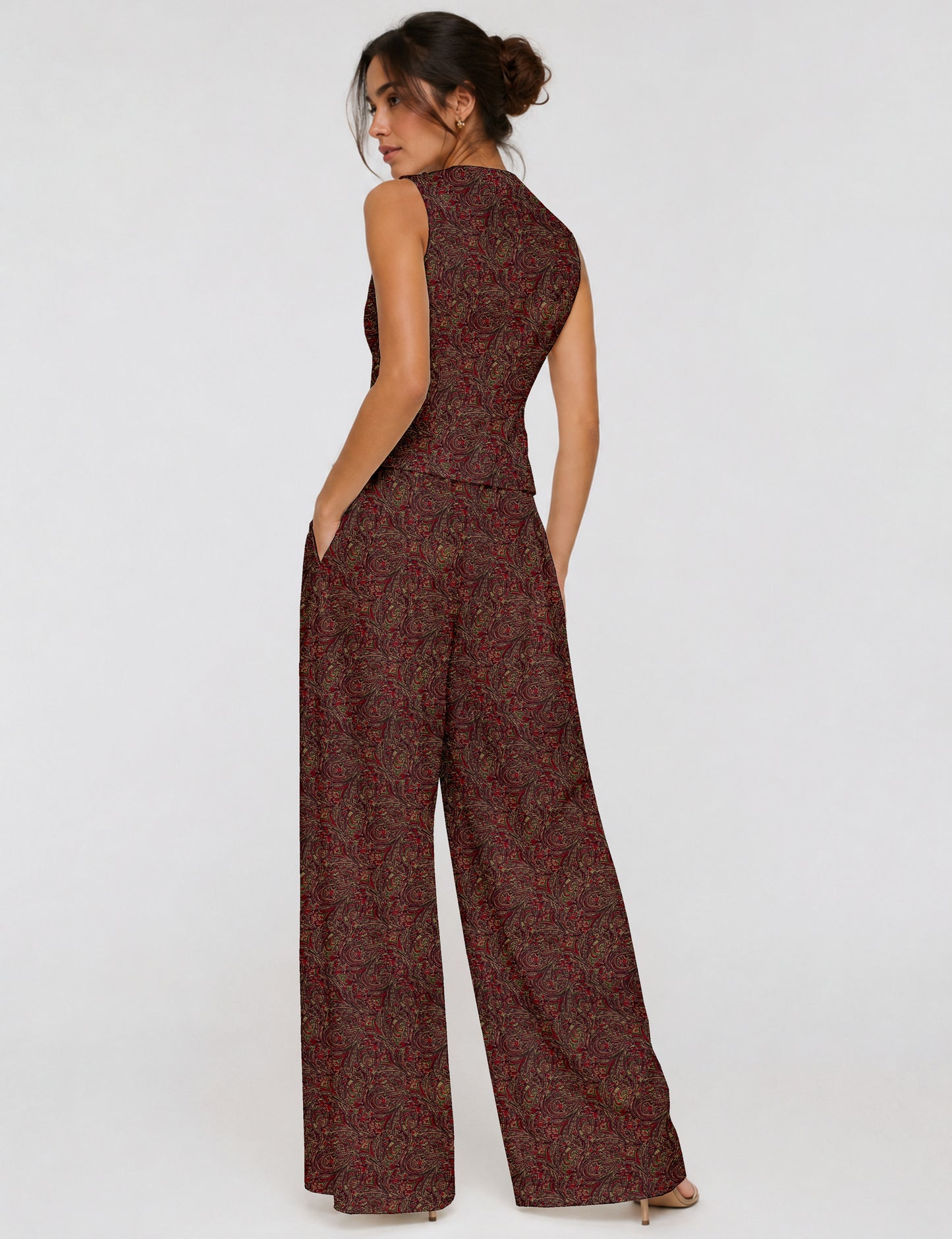 Women's tailored waistcoat set with a sleeveless V-neck button-front waistcoat and high-rise wide leg trousers in a coordinated matching outfit.