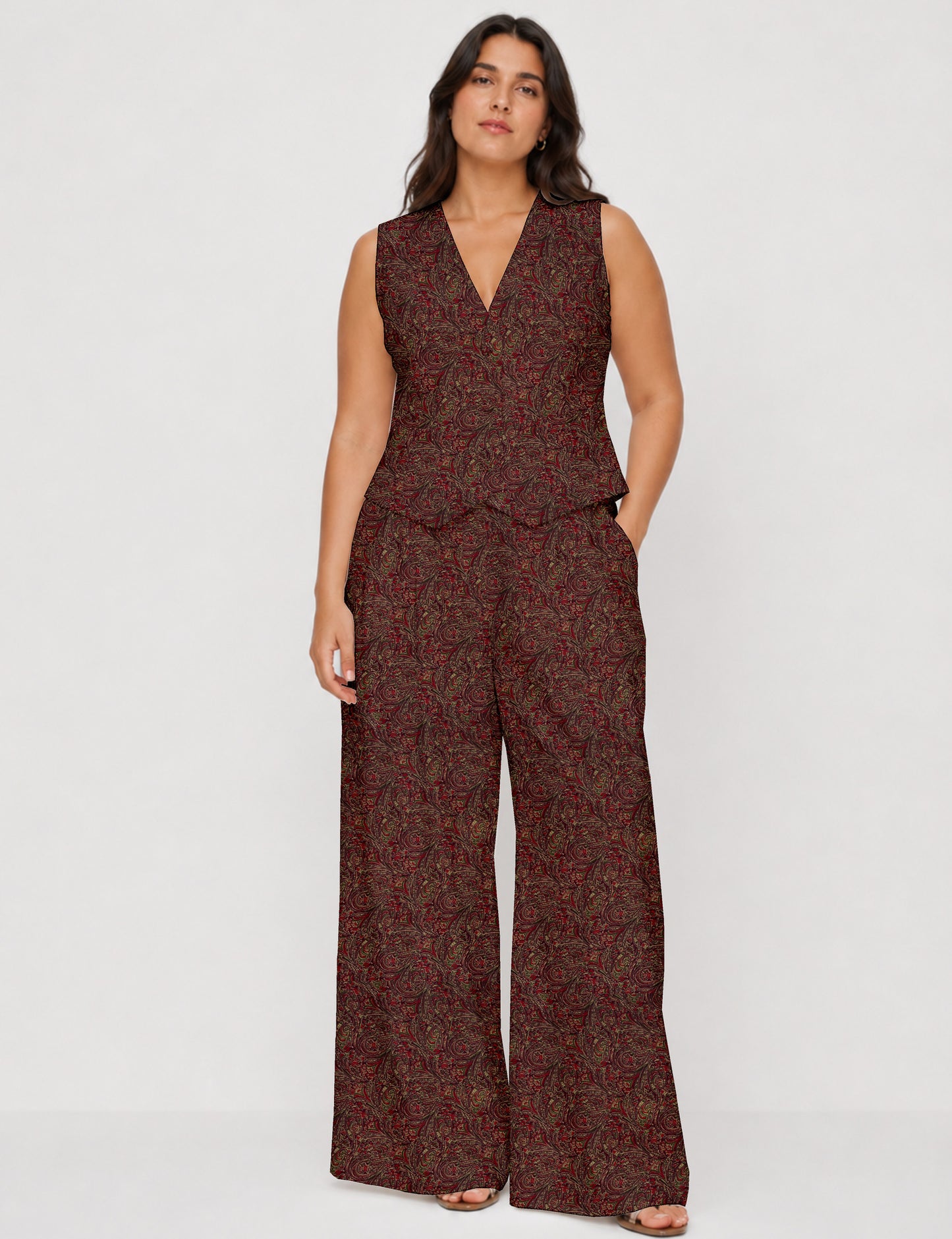 Women's tailored waistcoat set with a sleeveless V-neck button-front waistcoat and high-rise wide leg trousers in a coordinated matching outfit.