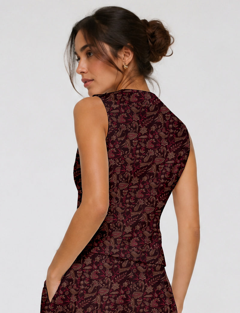 Women's fitted waistcoat with V-neck, single-breasted button closure, tailored silhouette, and pointed hem in sustainable fashion.
