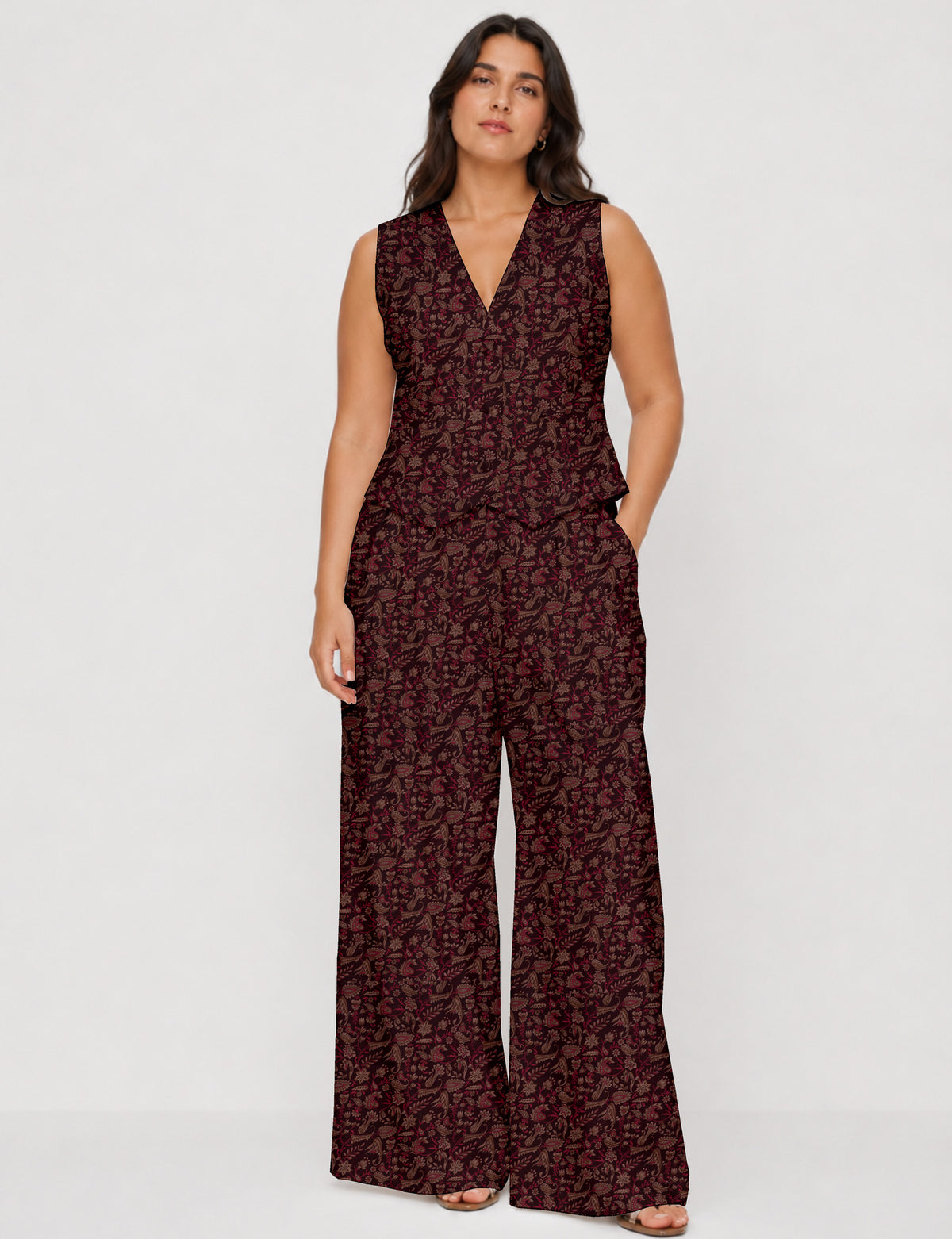 Women's tailored waistcoat set with a sleeveless V-neck button-front waistcoat and high-rise wide leg trousers in a coordinated matching outfit.