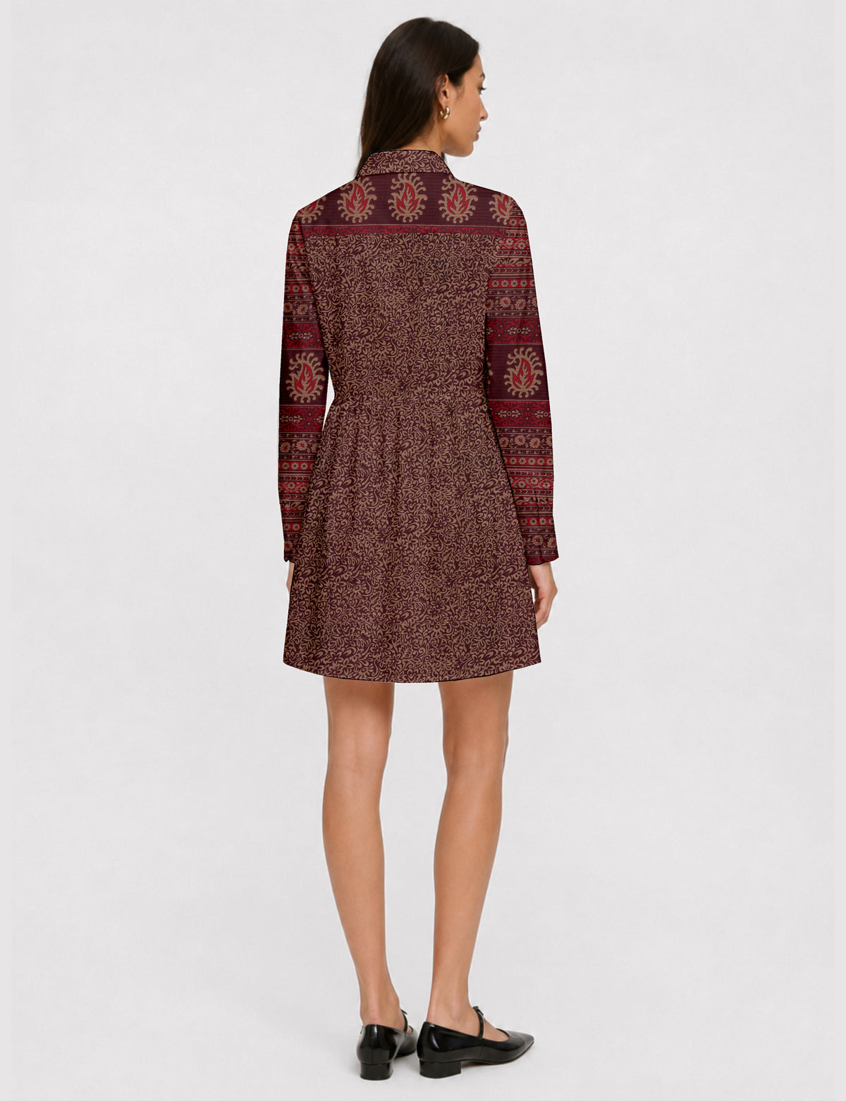Short shirt dress with a relaxed A-line silhouette, point collar, partial button placket, gathered waist, side pockets, and full-length cuffed sleeves.