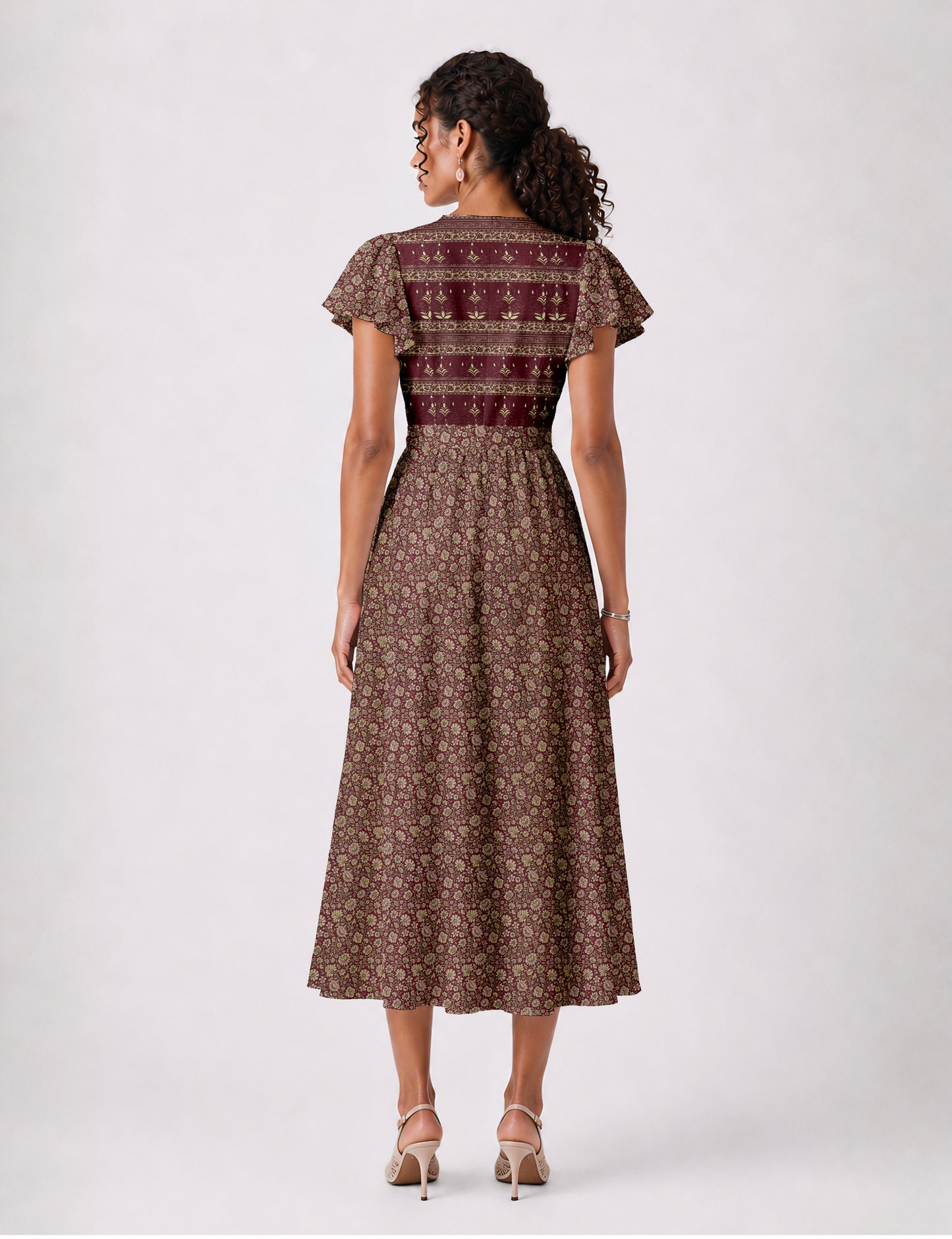 Elegant midi wrap dress with a V-neckline, adjustable waist tie, fitted bodice, and flared skirt for a timeless, flattering silhouette.