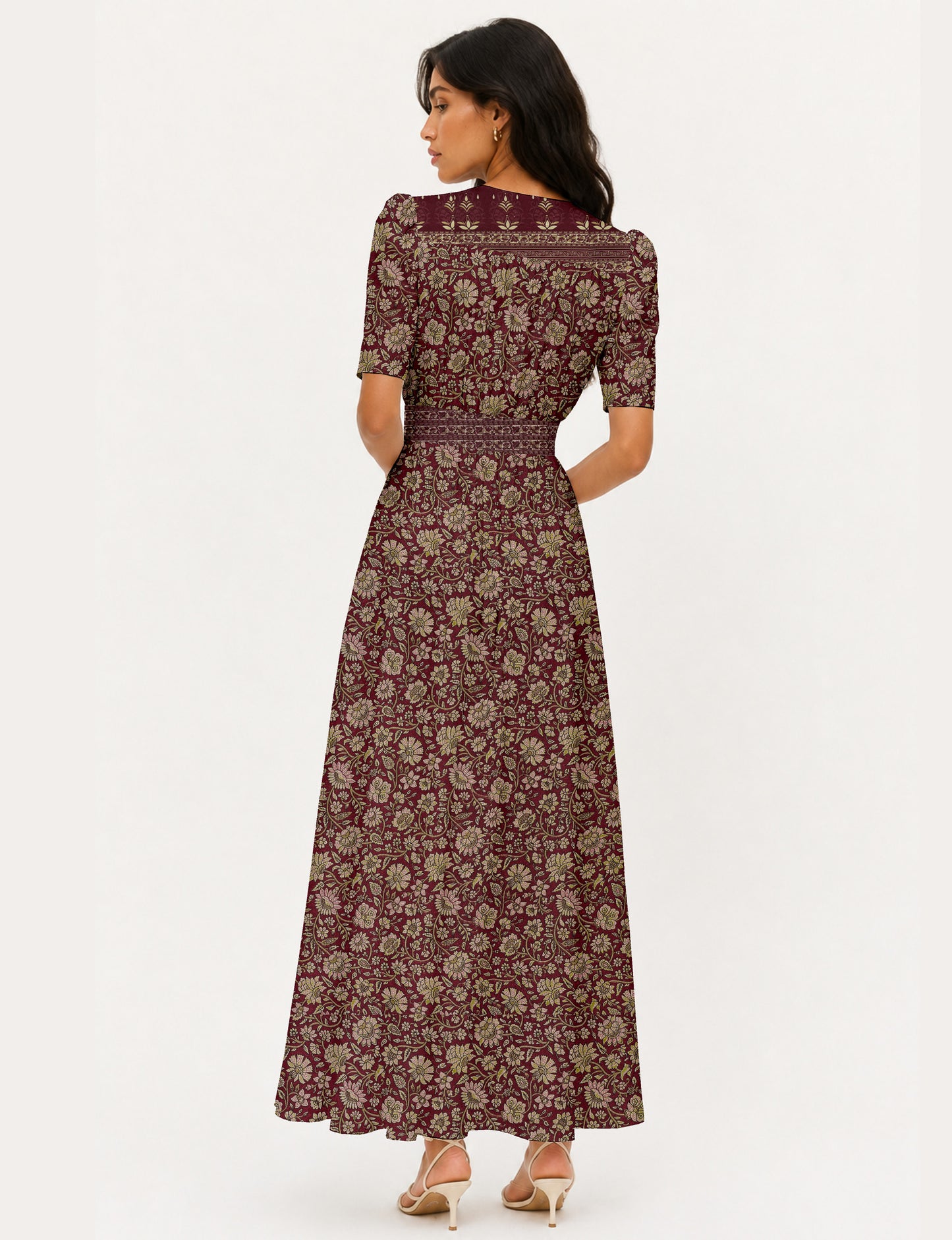 Maxi romantic dress with a fitted bodice, V-neckline, functional button placket, structured waist panel, short sleeves, and a softly flared ankle-length A-line skirt.