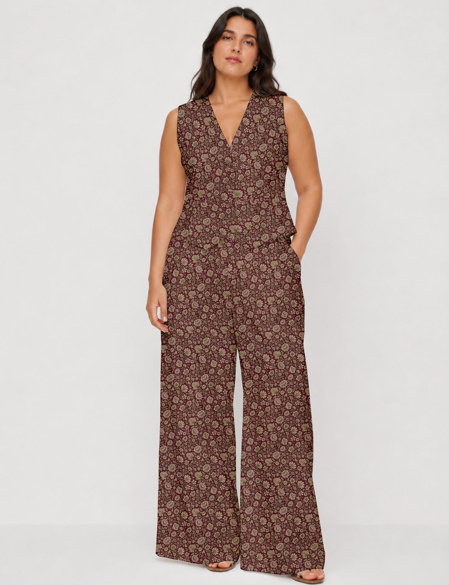 Women's tailored waistcoat set with a sleeveless V-neck button-front waistcoat and high-rise wide leg trousers in a coordinated matching outfit.