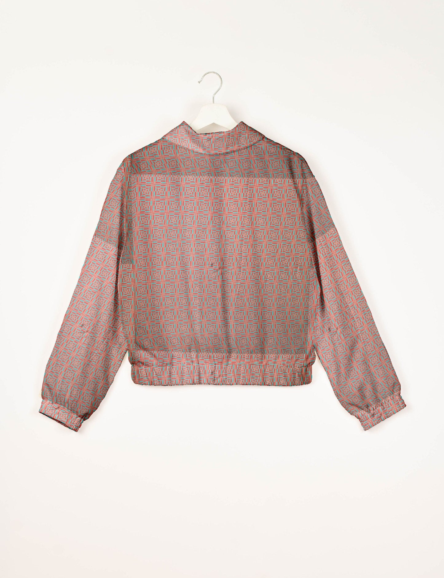 Upcycled Bomber Jacket made from recycled sari materials, featuring a cute cropped shape, elasticated hem and cuffs, and contrast sari print lining. Sustainable apparel promoting eco-friendly fashion and ethical clothing.