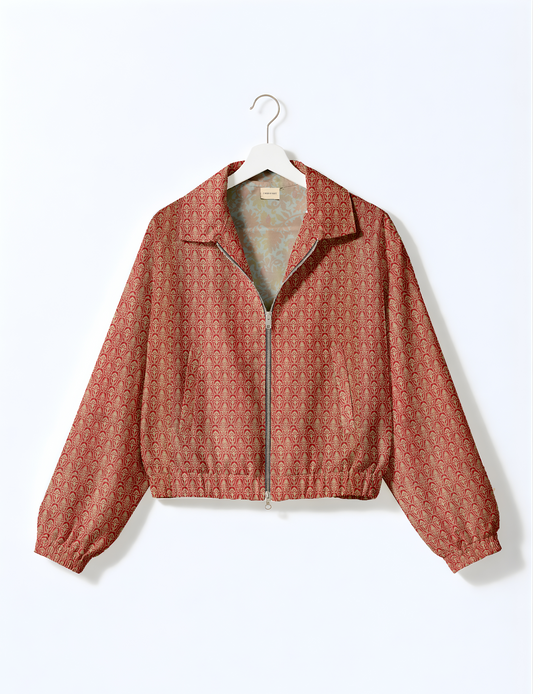 Upcycled Bomber Jacket made from recycled sari materials, featuring a cute cropped shape, elasticated hem and cuffs, and contrast sari print lining. Sustainable apparel promoting eco-friendly fashion and ethical clothing.