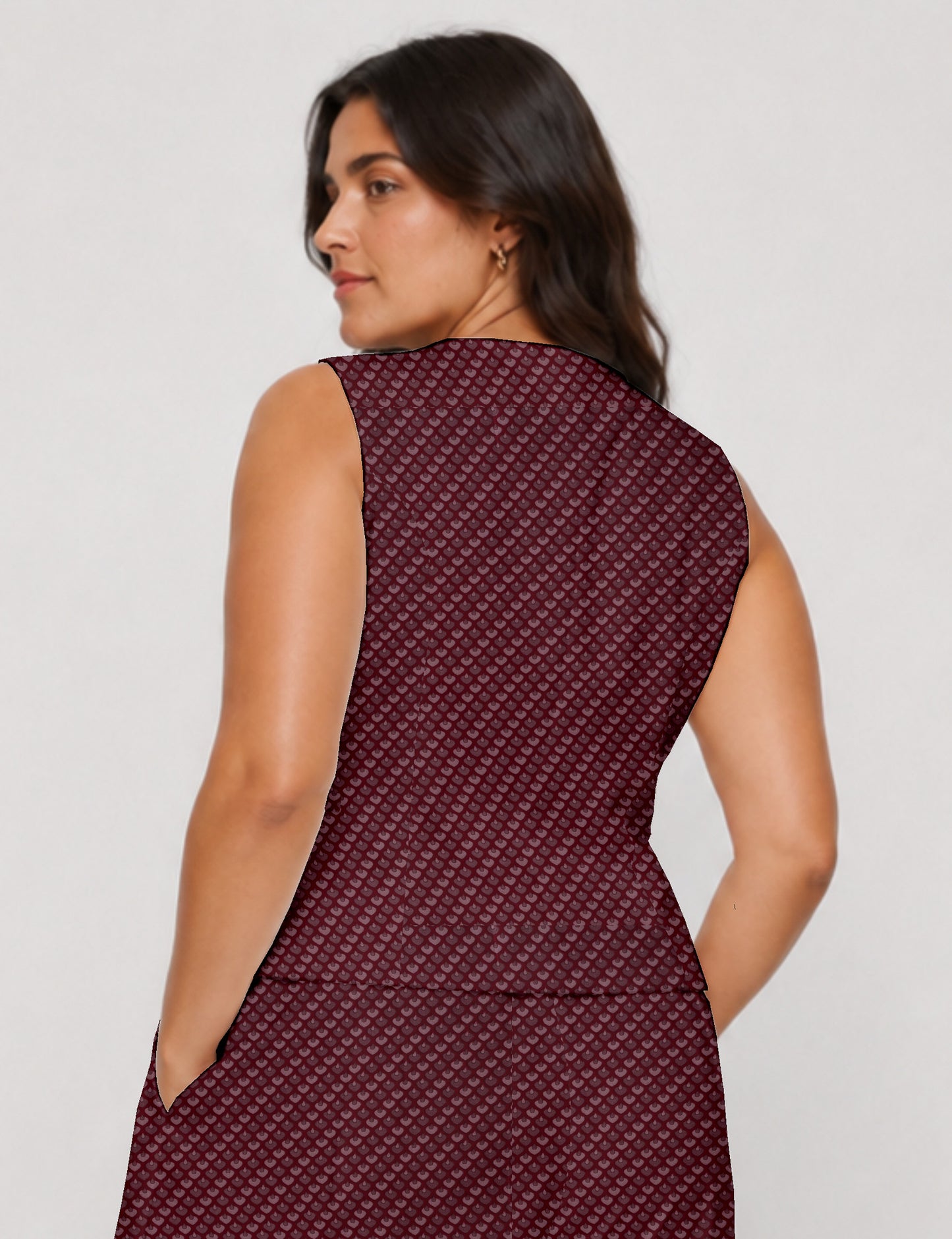 Women's fitted waistcoat with V-neck, single-breasted button closure, tailored silhouette, and pointed hem in sustainable fashion.
