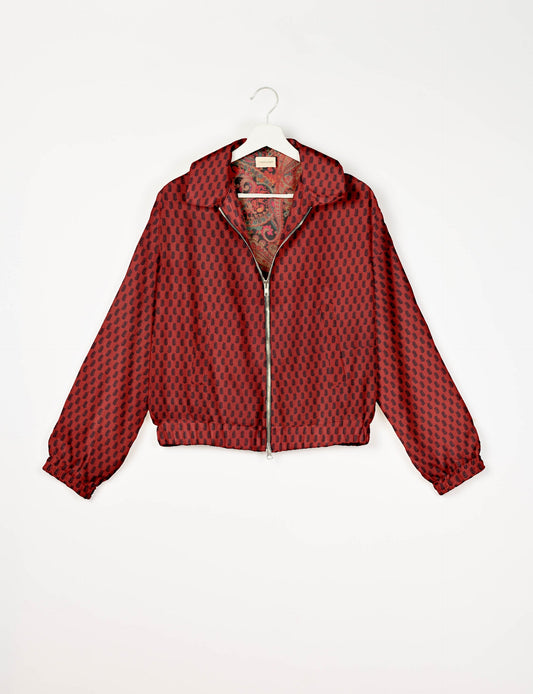 Upcycled Bomber Jacket made from recycled sari materials, featuring a cute cropped shape, elasticated hem and cuffs, and contrast sari print lining. Sustainable apparel promoting eco-friendly fashion and ethical clothing.