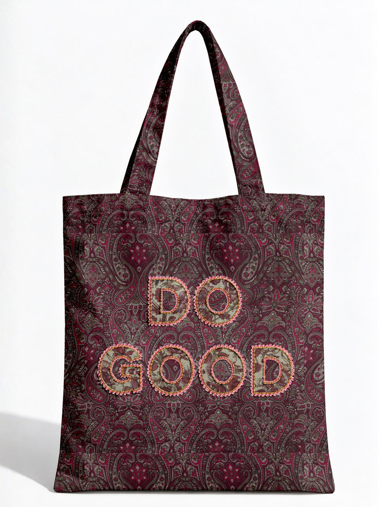 DO GOOD tote bag featuring contrasting sari fabric appliqué lettering, double shoulder straps, soft construction and an internal slip pocket with piping detail.