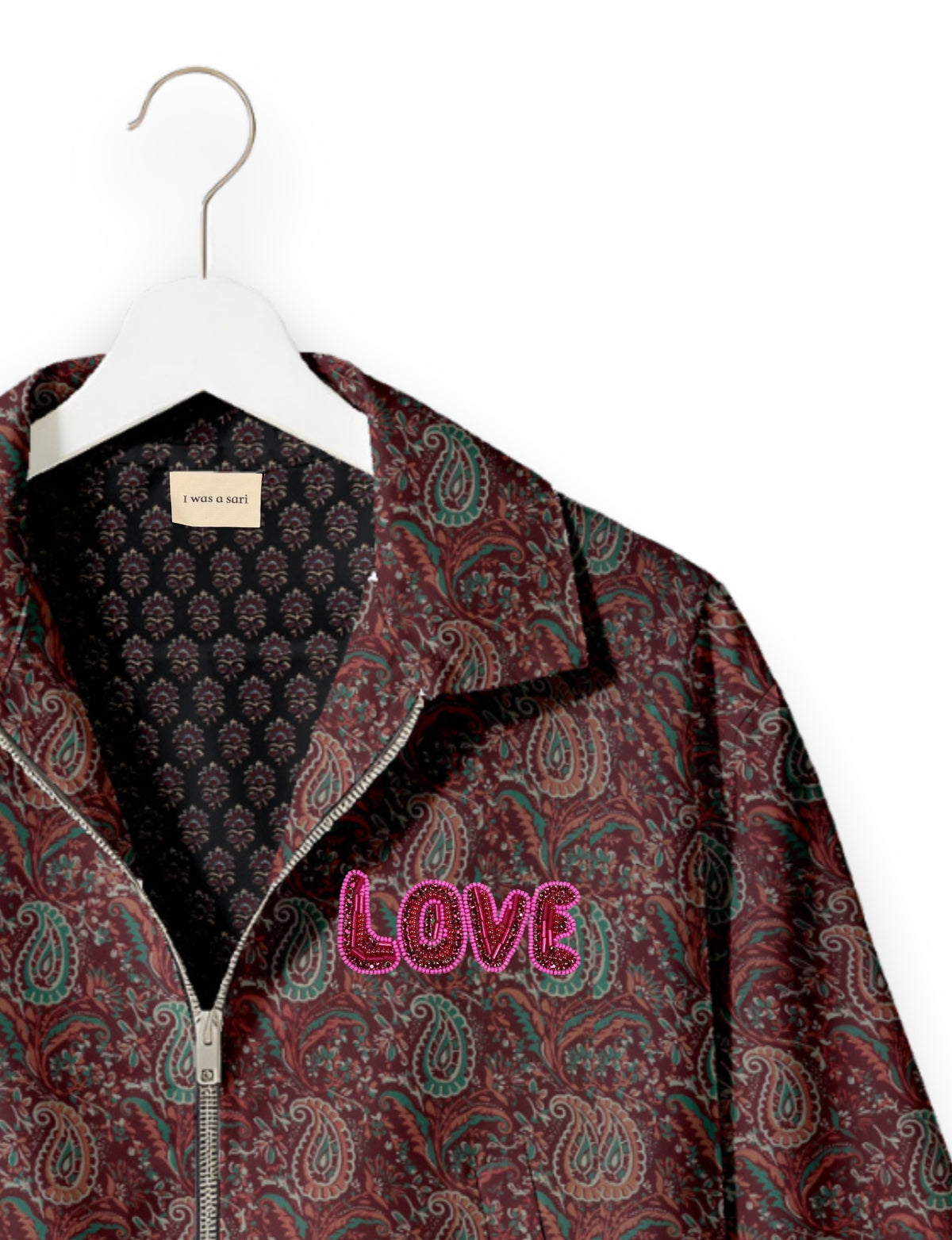 Love Bomber Jacket made from recycled fabric, featuring hand-stitched Aari embroidery. A unique piece of zero-waste clothing, part of the circular fashion movement. Designed with upcycled materials for a stylish yet environmentally friendly clothing choice.