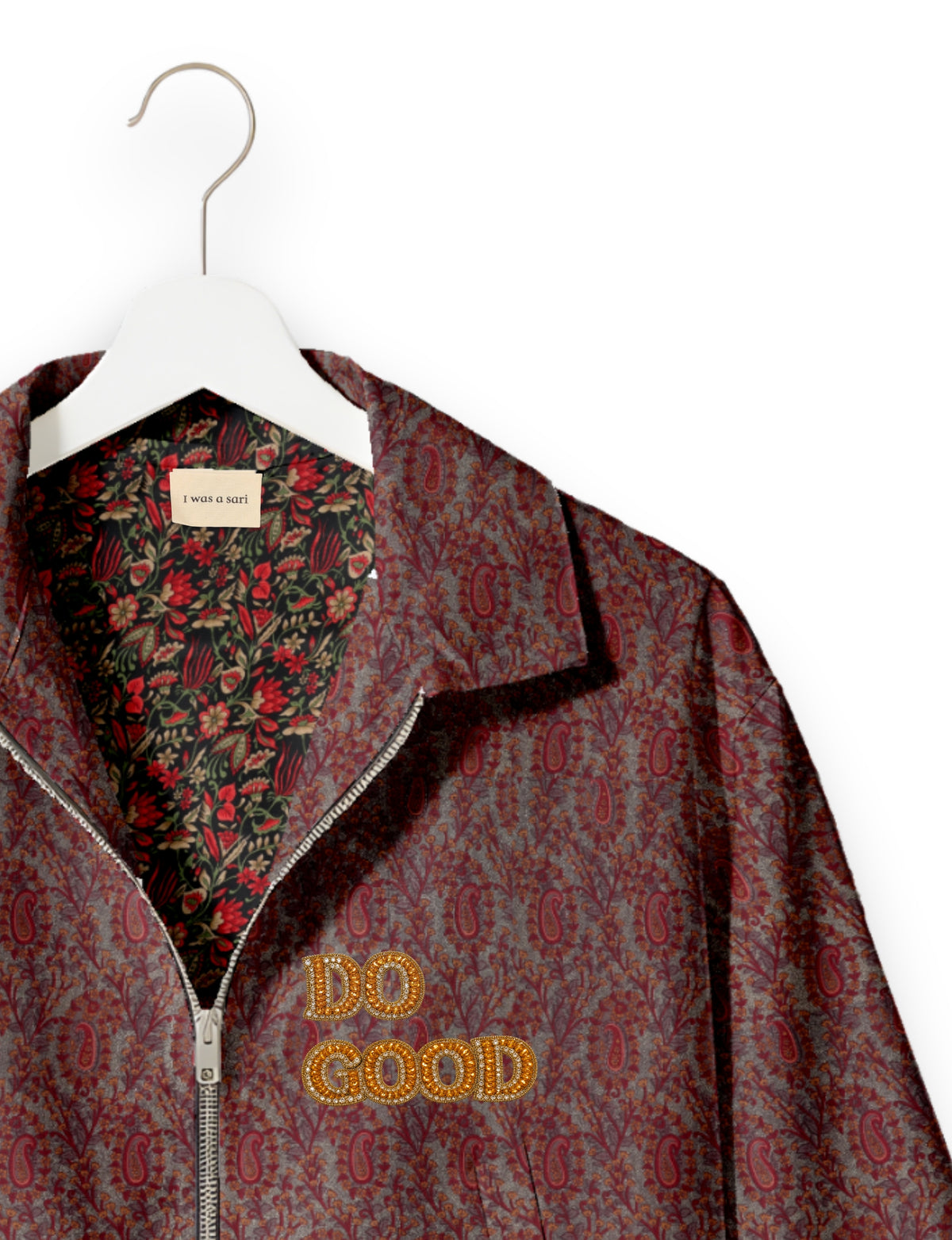Gold cropped DO GOOD bomber jacket featuring hand-embroidered lettering on the left chest, contrasting inner lining and two functional pockets.