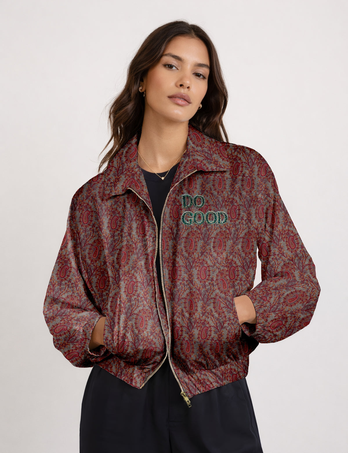 Green cropped bomber jacket with DO GOOD hand embroidery on the left chest and contrasting inner.