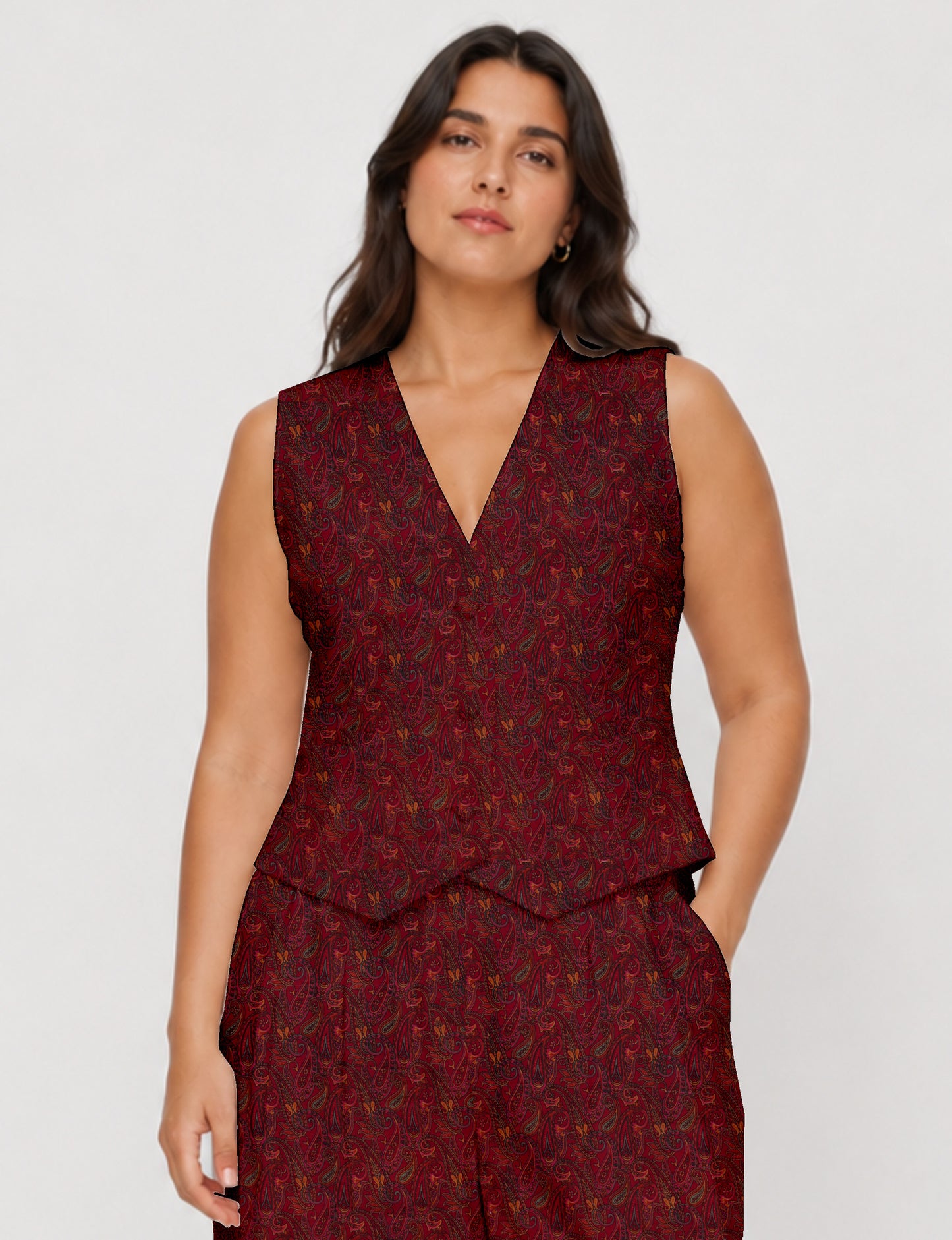 Women's fitted waistcoat with V-neck, single-breasted button closure, tailored silhouette, and pointed hem in sustainable fashion.