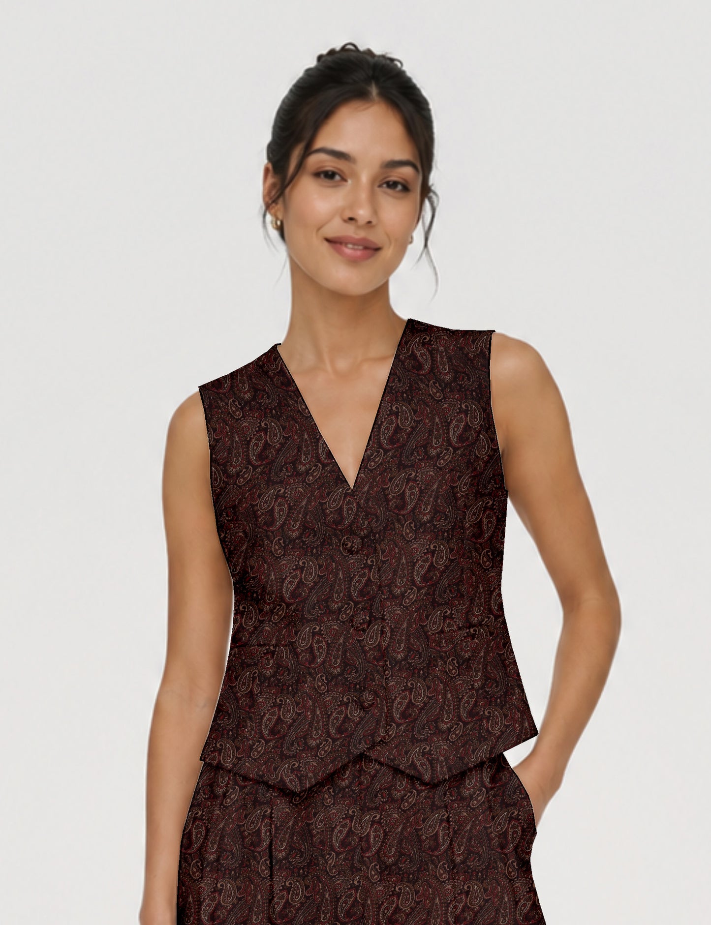 Women's fitted waistcoat with V-neck, single-breasted button closure, tailored silhouette, and pointed hem in sustainable fashion.