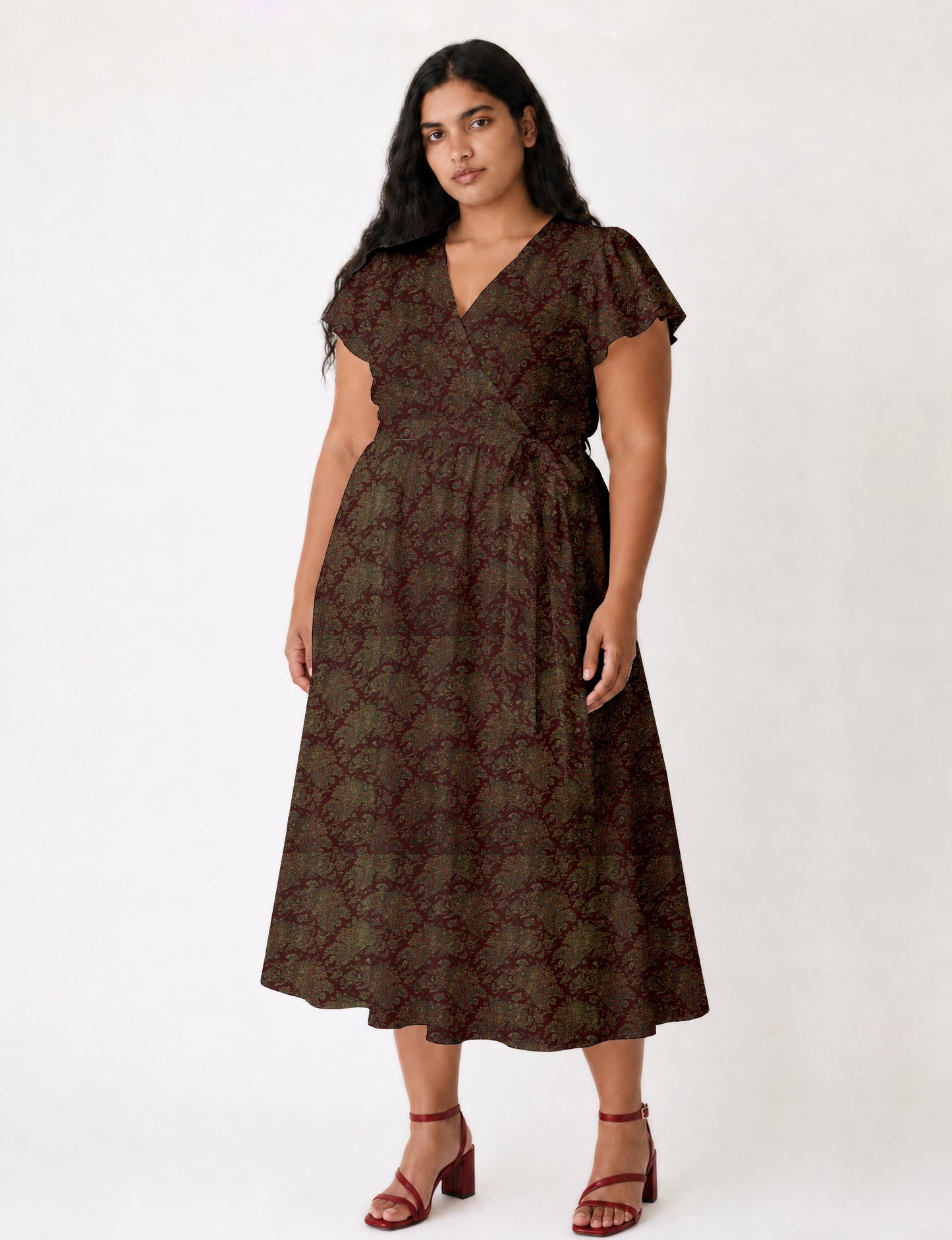 Midi wrap dress with V-neckline, fitted bodice, tie waist, and flared mid-calf skirt