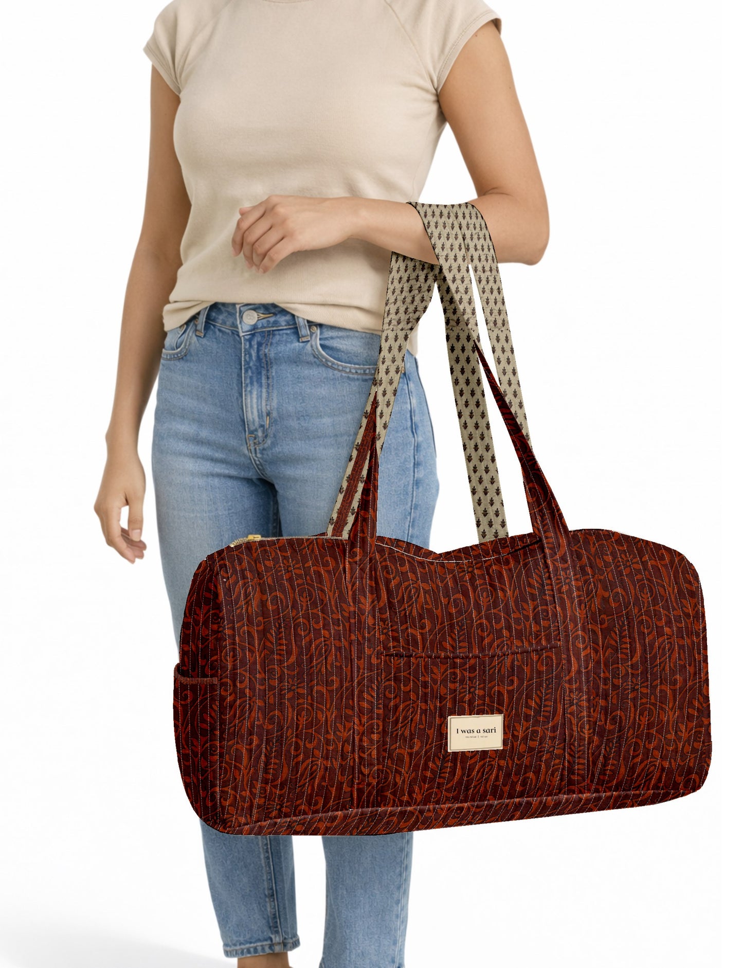 Quilted travel barrel bag with spacious interior and dual handles
Stylish quilted barrel handbag for daily use and short trips
Quilted barrel duffle-style bag with zip closure and inner pouch
I was a Sari quilted barrel bag front view showing structured shape
Quilted barrel bag side view highlighting size and handle drop
Open quilted barrel bag showing spacious interior and pouch