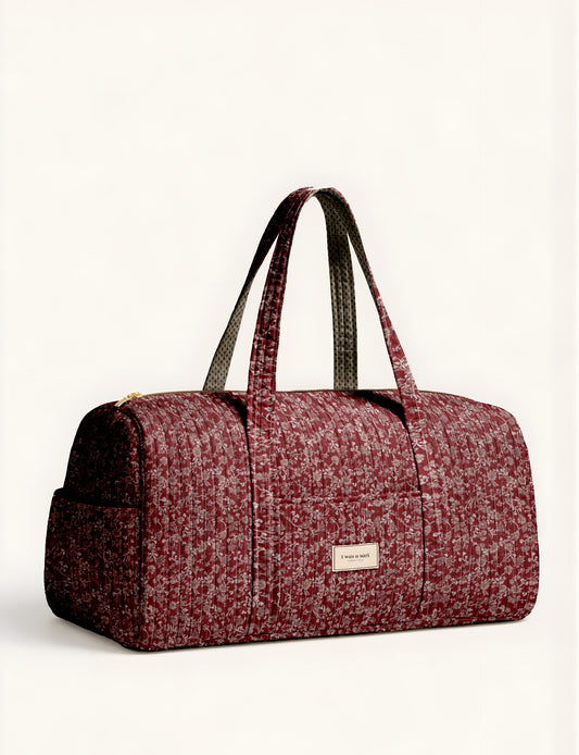 Quilted travel barrel bag with spacious interior and dual handles
Stylish quilted barrel handbag for daily use and short trips
Quilted barrel duffle-style bag with zip closure and inner pouch
I was a Sari quilted barrel bag front view showing structured shape
Quilted barrel bag side view highlighting size and handle drop
Open quilted barrel bag showing spacious interior and pouch