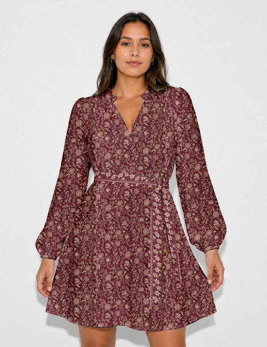 Swing dress with detachable tie belt, gathered ruffle neckline, full-length voluminous sleeves, elastic cuffs, and relaxed A-line silhouette in an above-knee length.