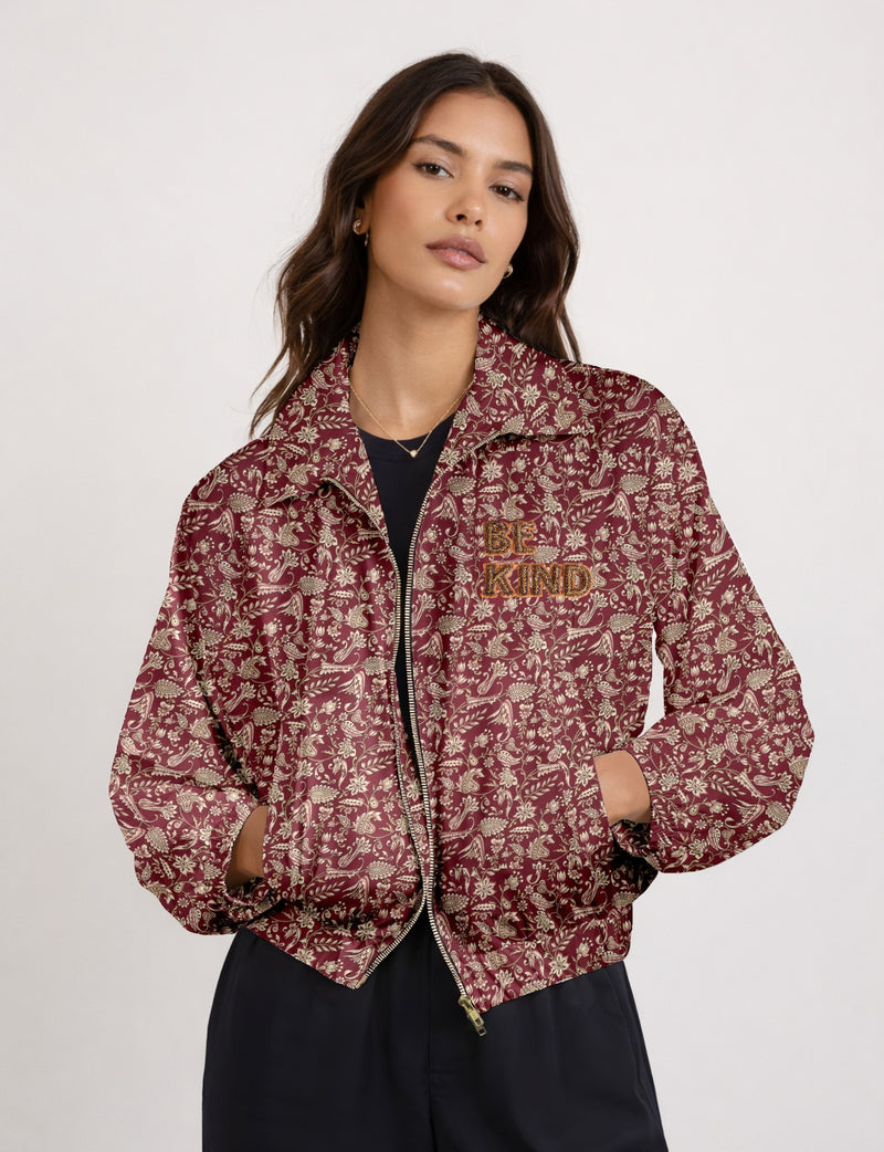 BE KIND Bomber jacket made from upcycled sari fabric with handcrafted Aari embroidery by female artisans.
