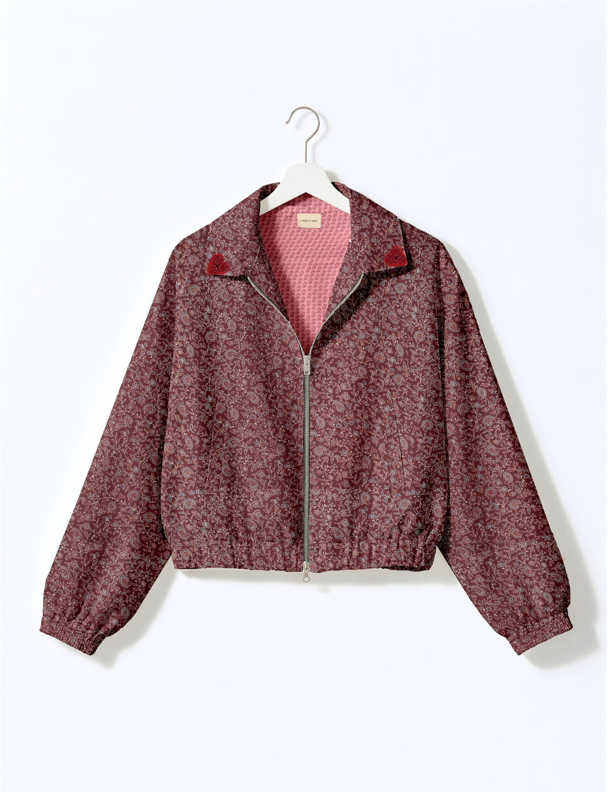 Love Bomber Jacket made from recycled fabric, featuring hand-stitched Aari embroidery. A unique piece of zero-waste clothing, part of the circular fashion movement. Designed with upcycled materials for a stylish yet environmentally friendly clothing choice.