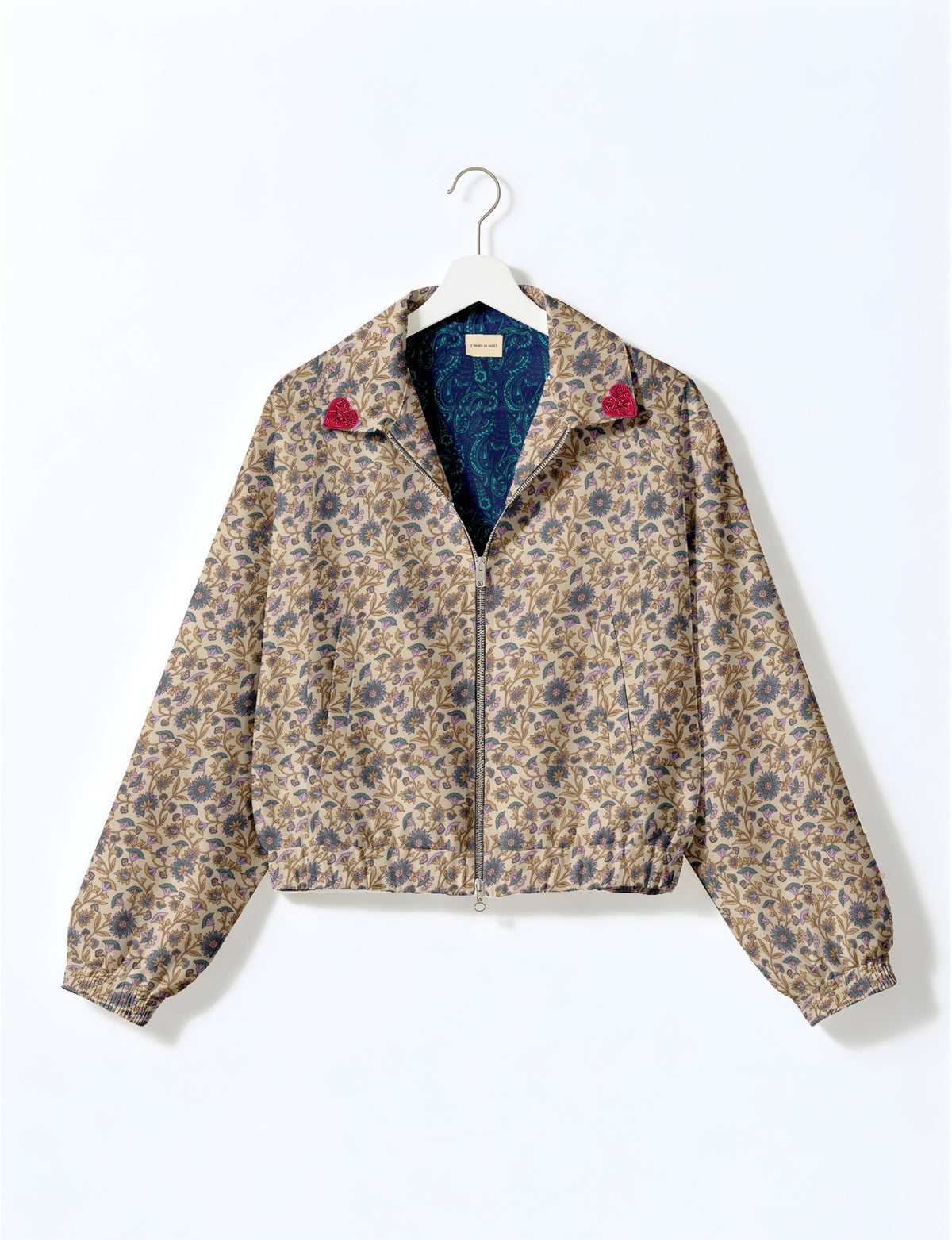 Love Bomber Jacket made from recycled fabric, featuring hand-stitched Aari embroidery. A unique piece of zero-waste clothing, part of the circular fashion movement. Designed with upcycled materials for a stylish yet environmentally friendly clothing choice.